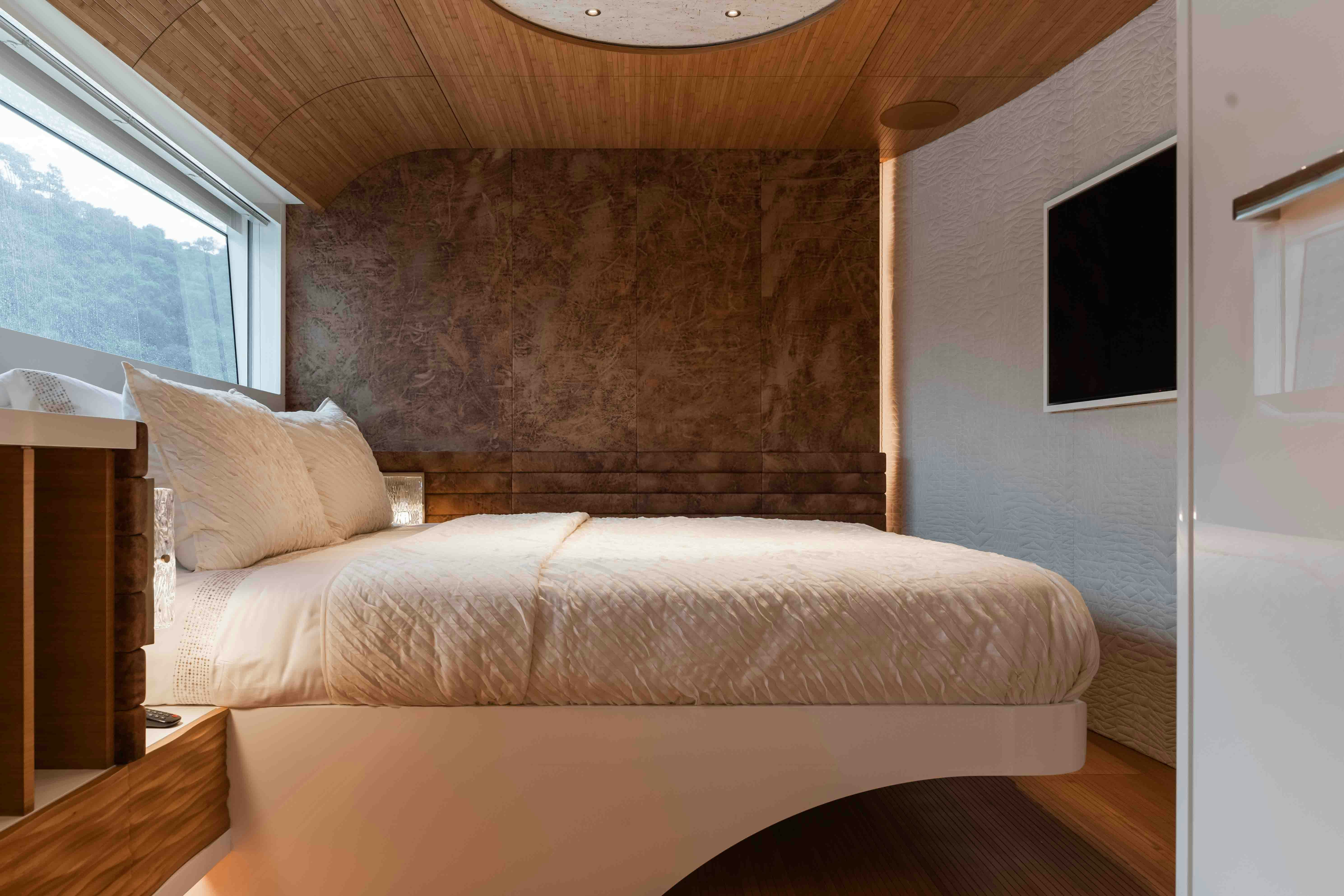 a bed in a room aboard NB 202 Yacht for Sale