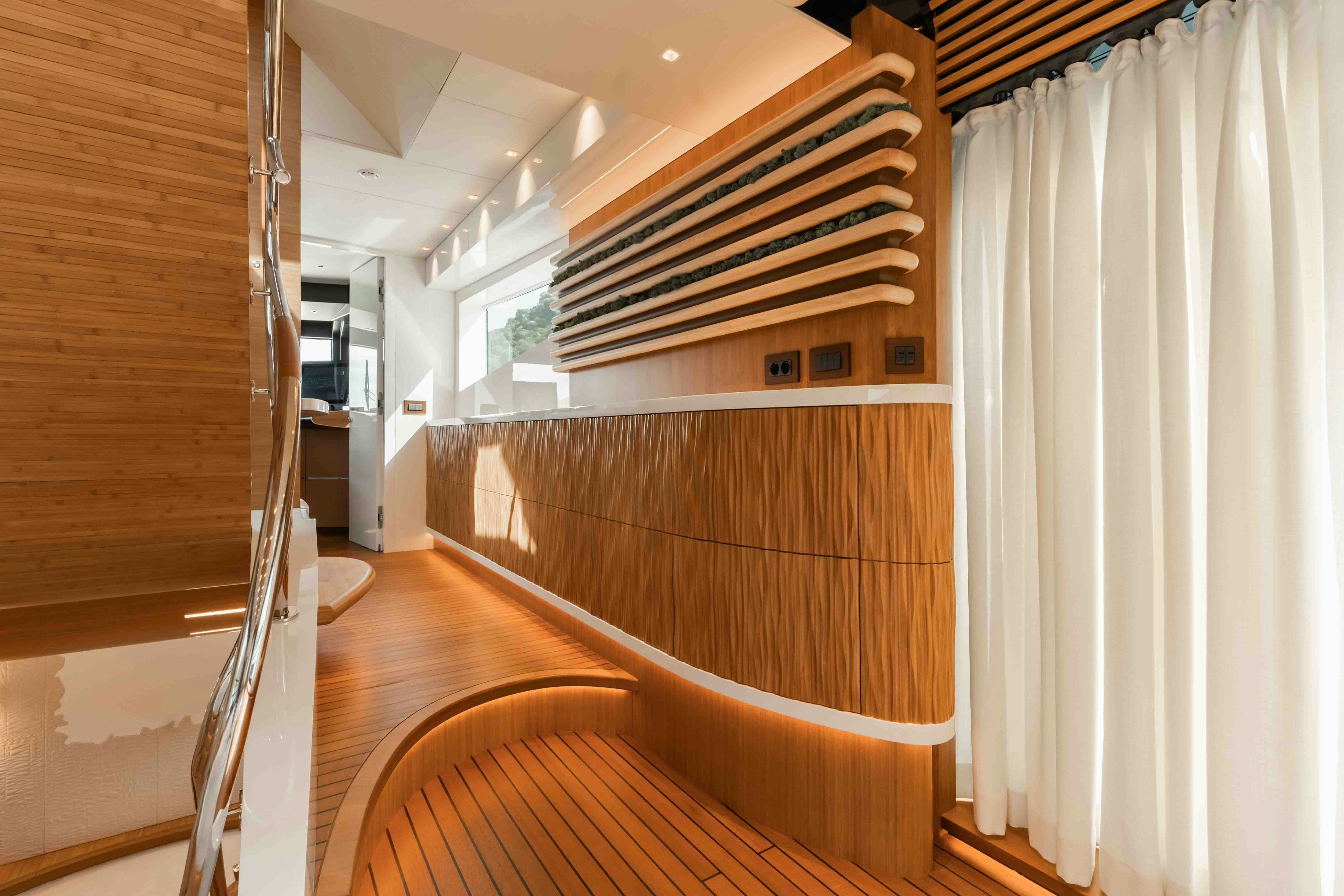 a room with a wood floor and a wood staircase aboard NB 202 Yacht for Sale
