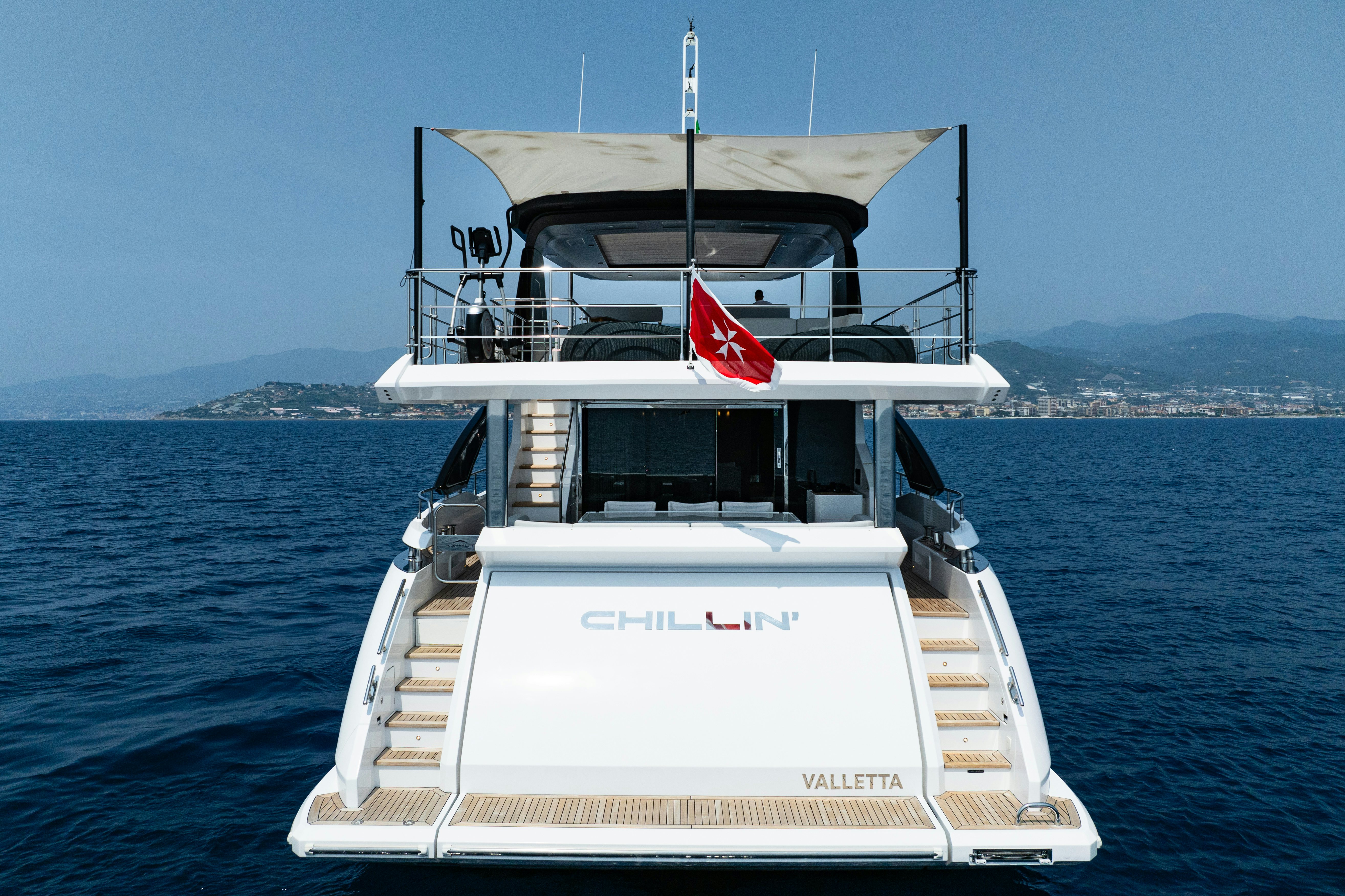 a boat on the water aboard CHILLIN’ Yacht for Sale