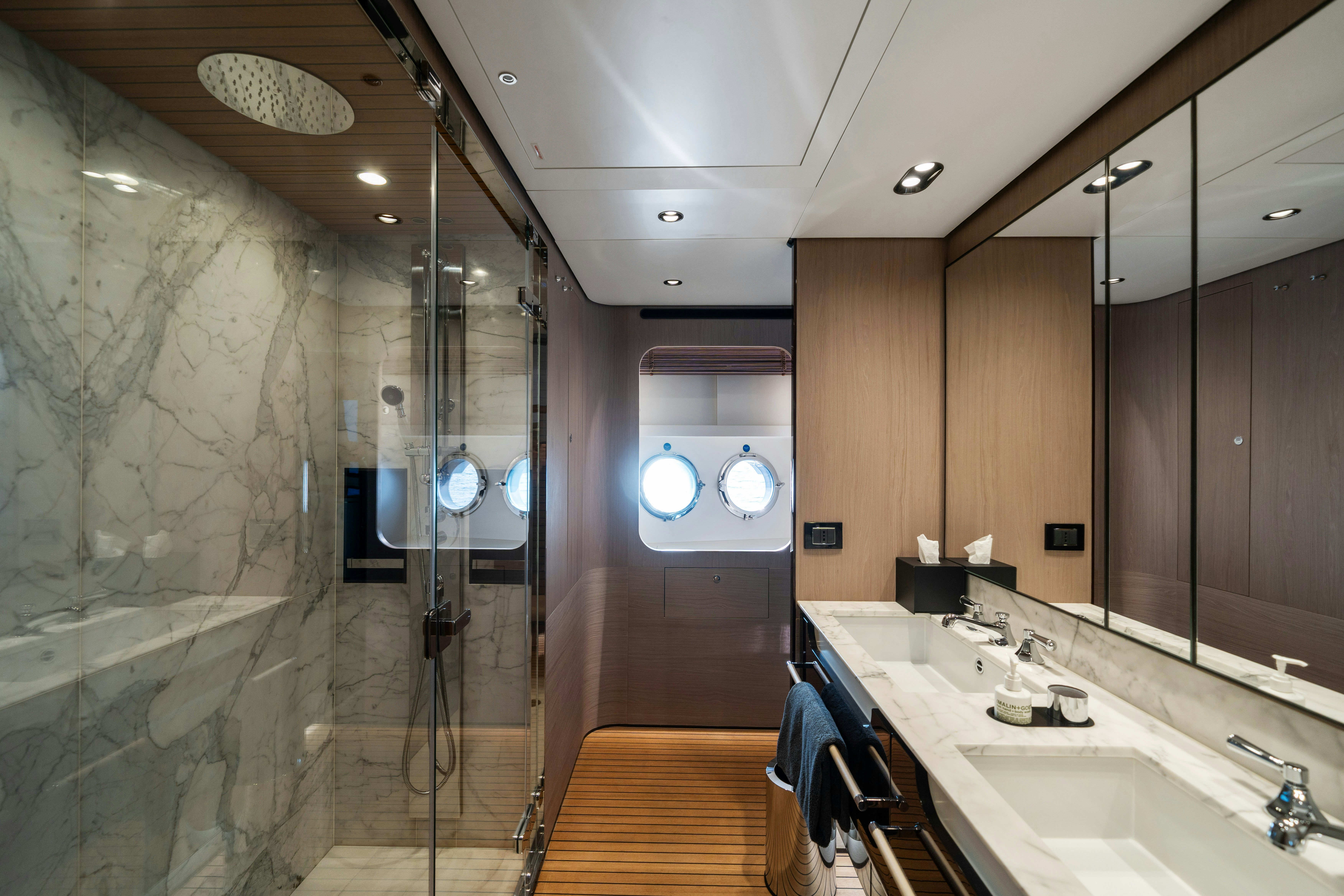 a bathroom with a large shower aboard CHILLIN’ Yacht for Sale