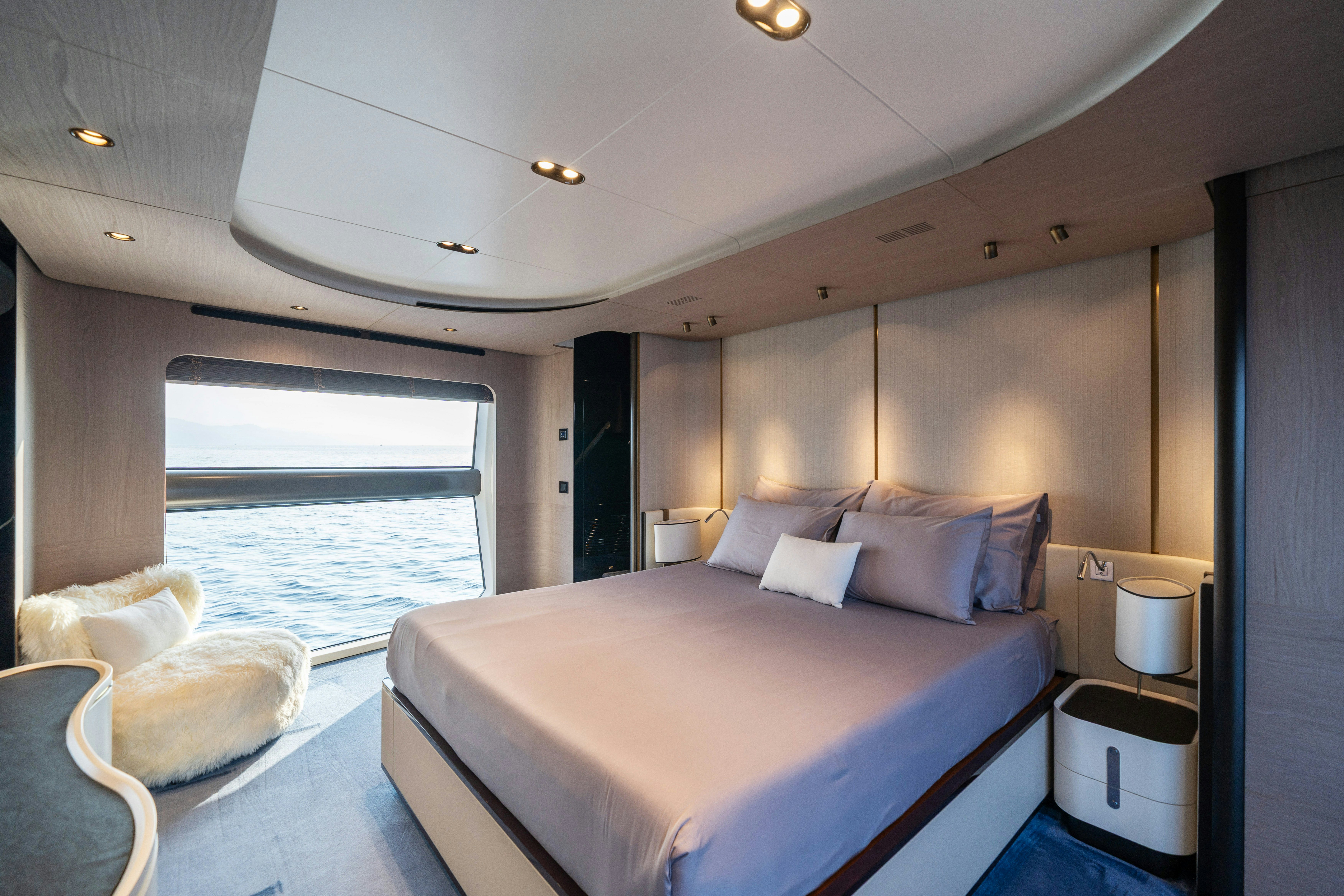 a bed in a room aboard CHILLIN’ Yacht for Sale