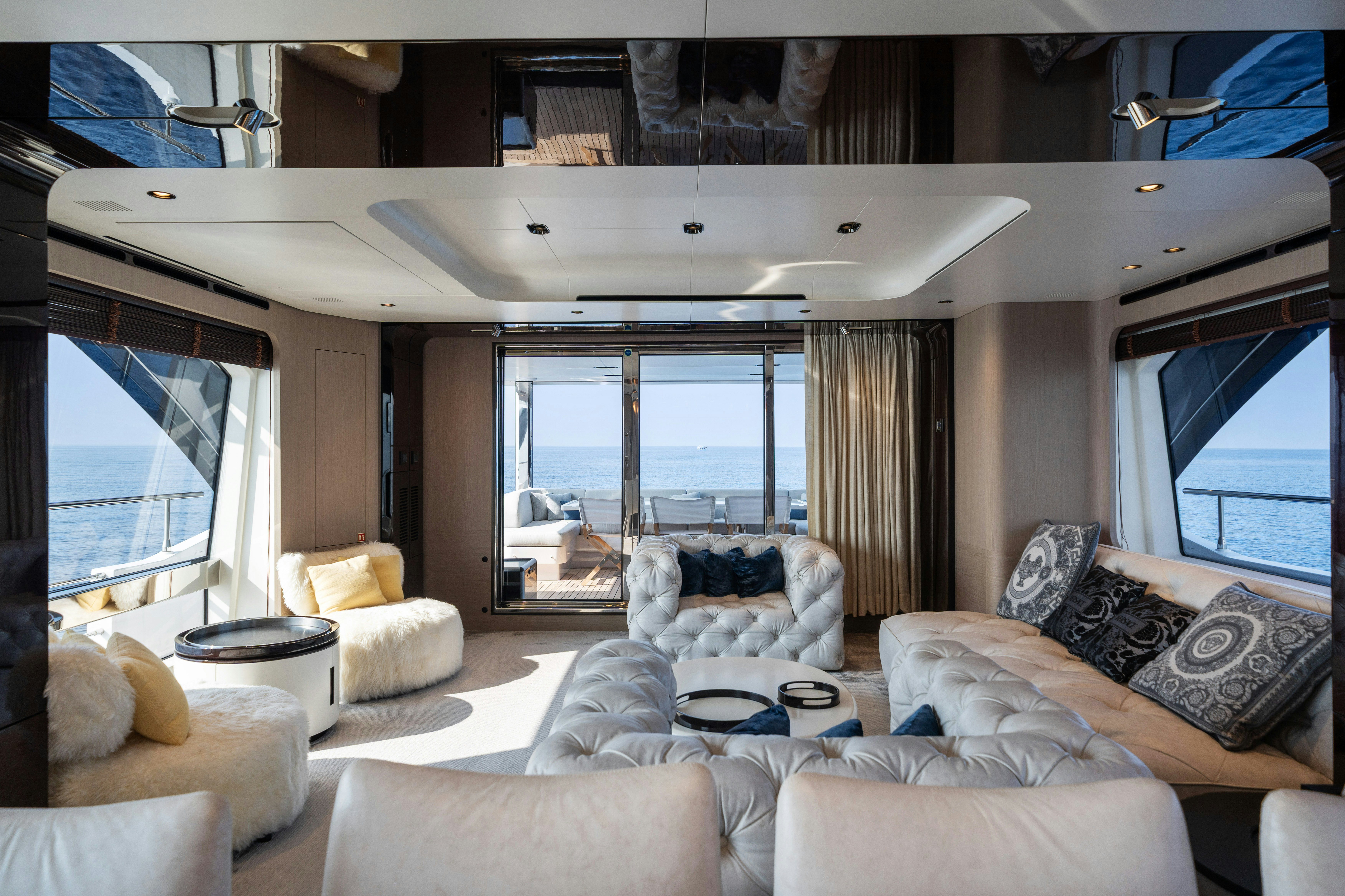 a living room with a large window aboard CHILLIN’ Yacht for Sale