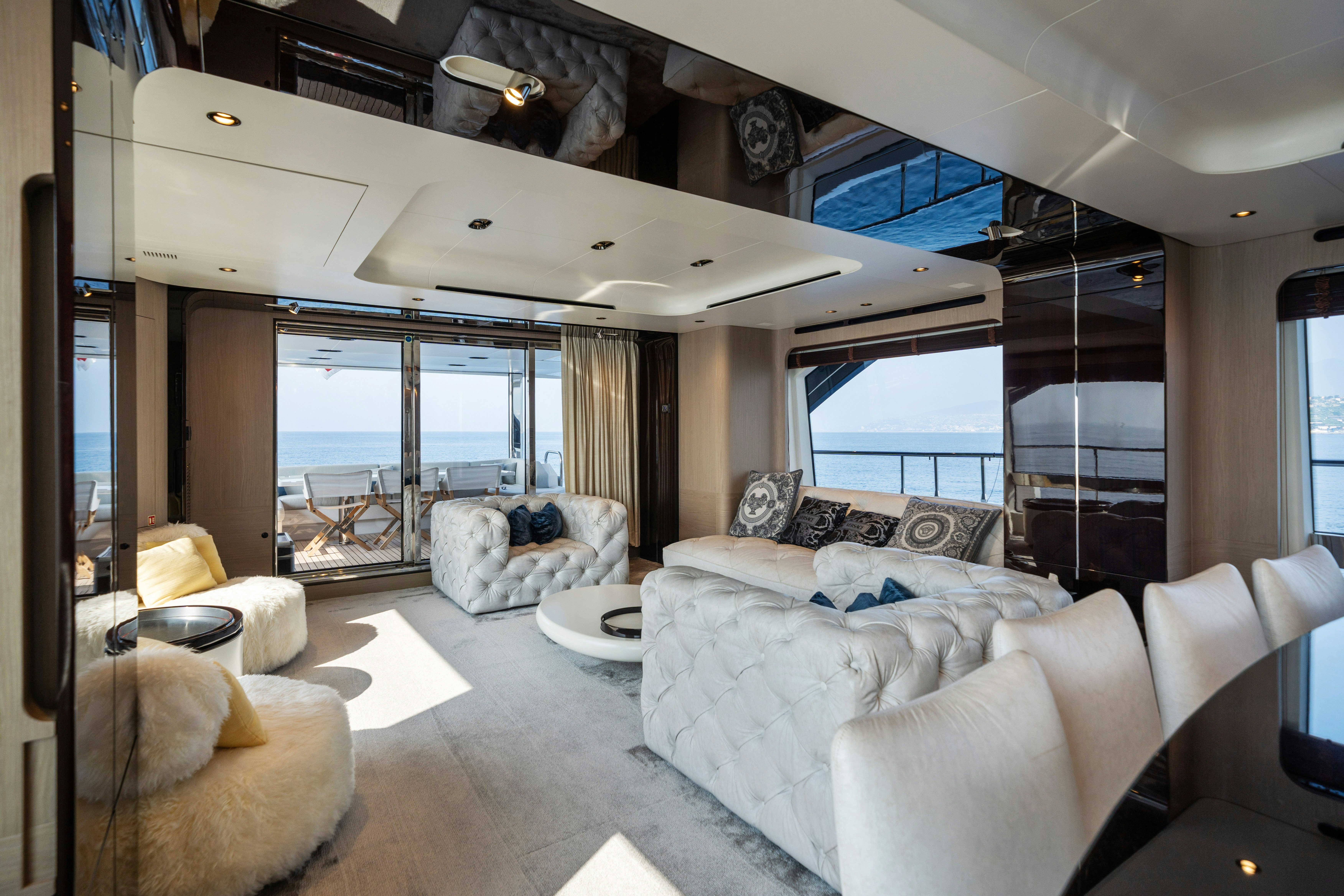 a living room with a large window aboard CHILLIN’ Yacht for Sale