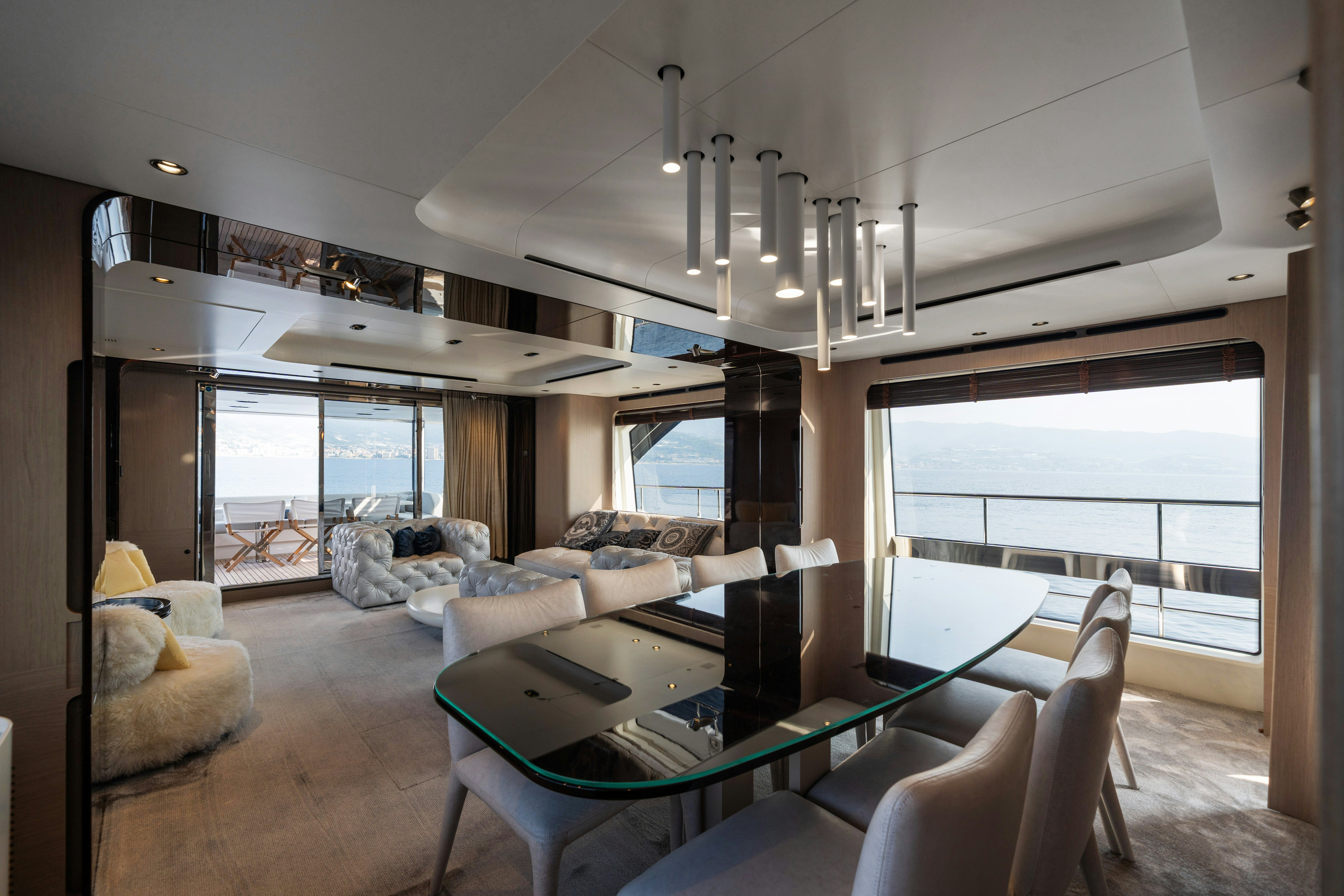 a living room with a large window aboard CHILLIN’ Yacht for Sale