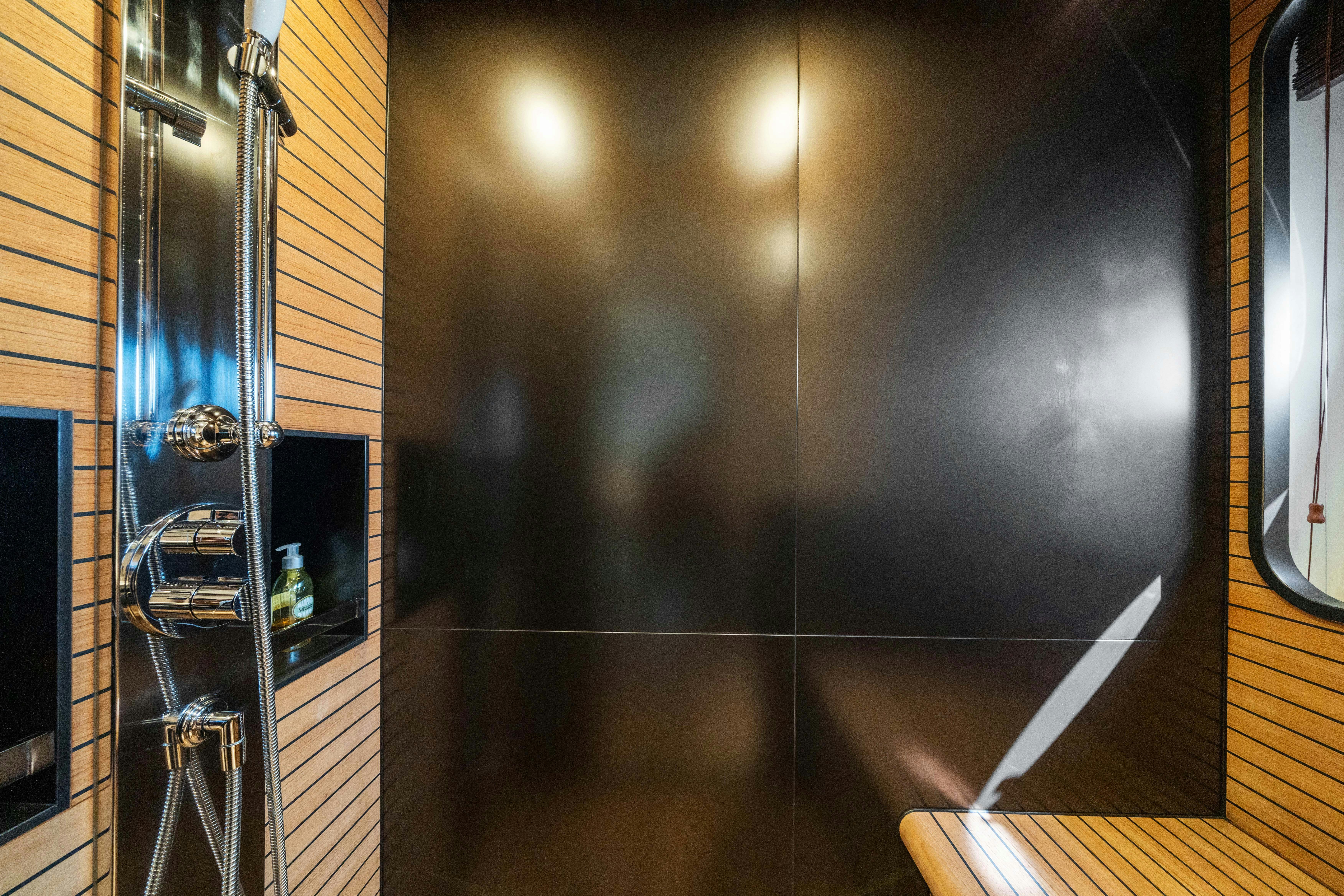 a wall with a light on it aboard CHILLIN’ Yacht for Sale