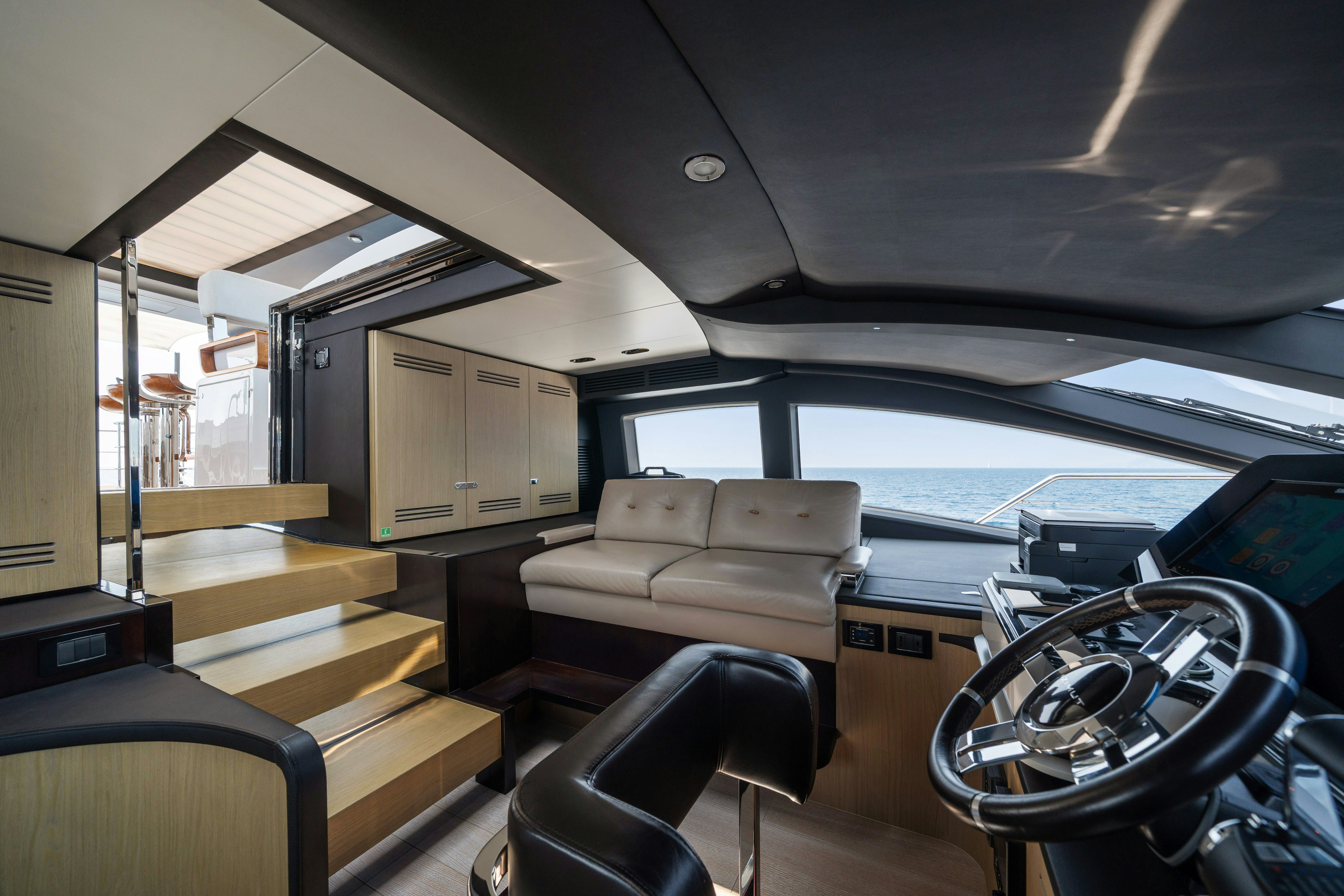 inside of a car aboard CHILLIN’ Yacht for Sale