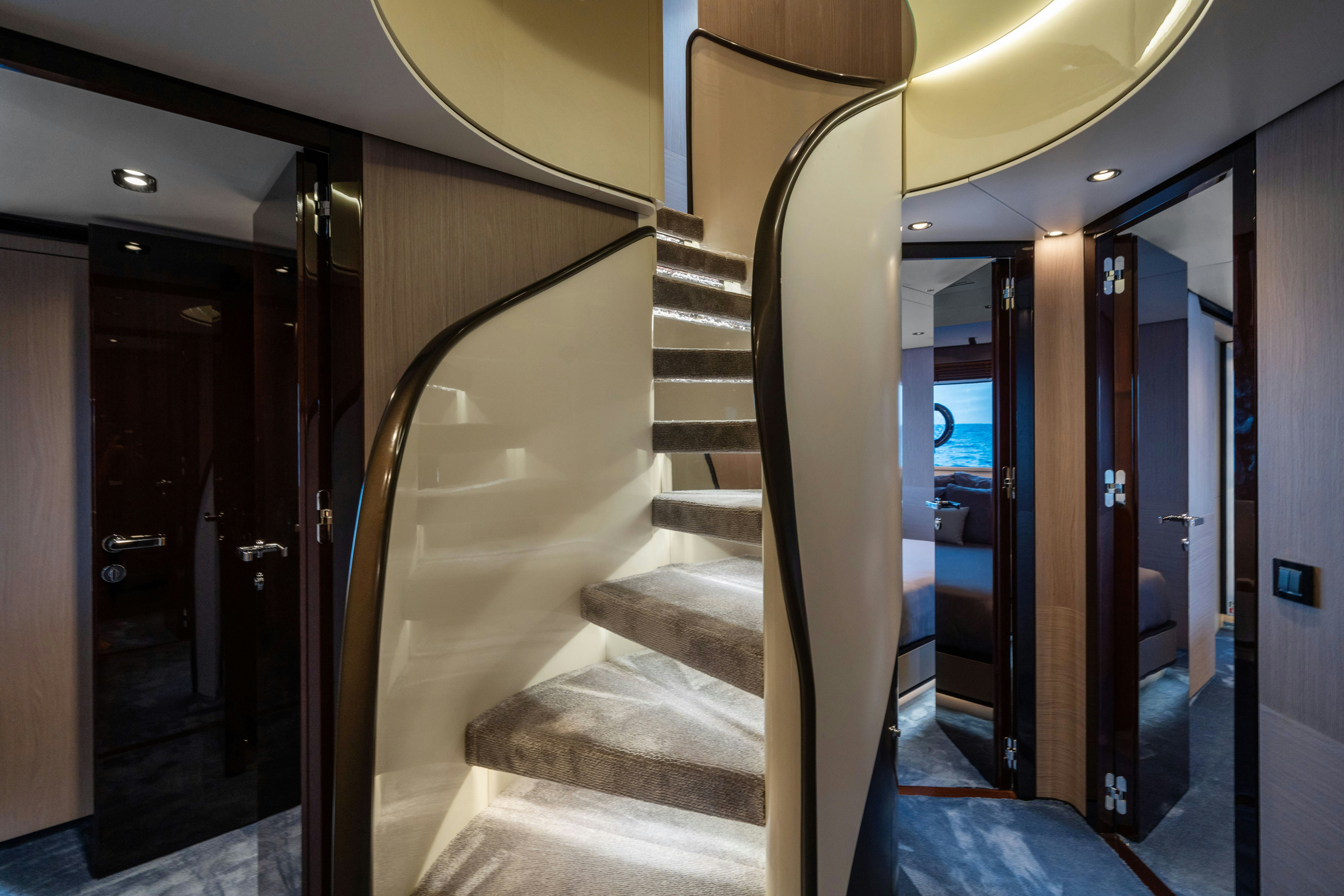 a hallway with doors aboard CHILLIN’ Yacht for Sale