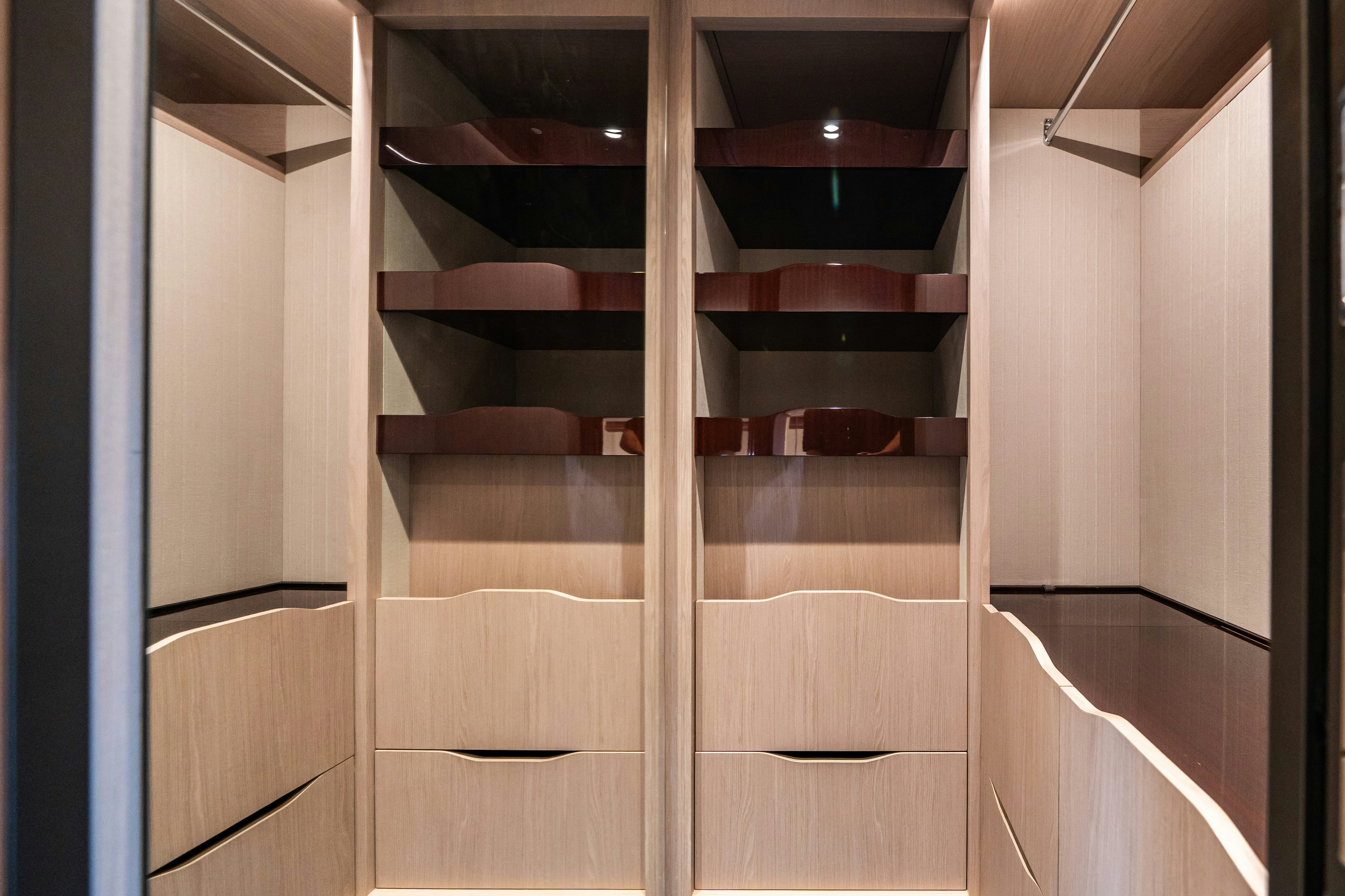 a set of wooden stairs aboard CHILLIN’ Yacht for Sale