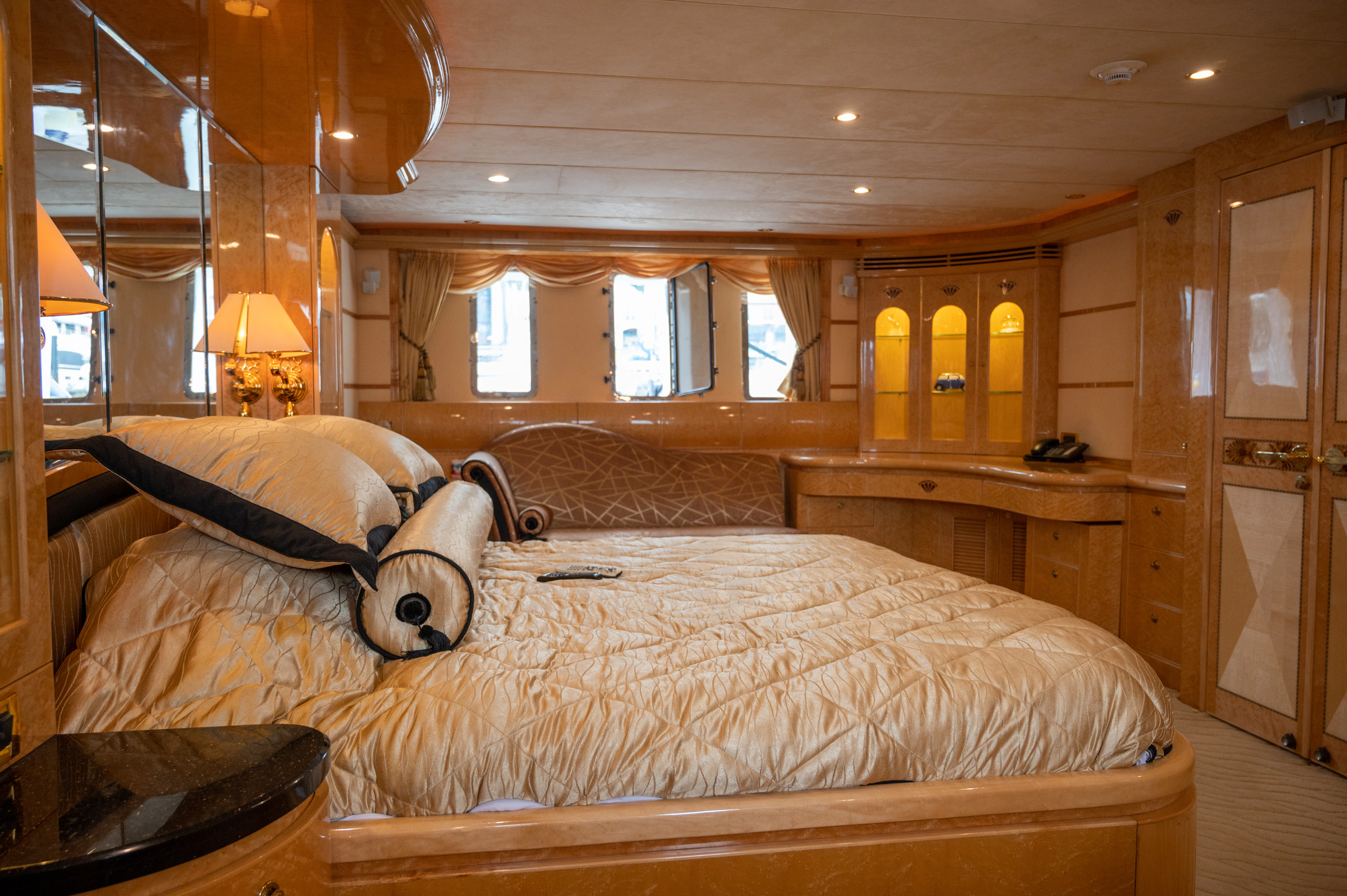 a large bed in a cabin aboard LADY EILEEN II Yacht for Sale