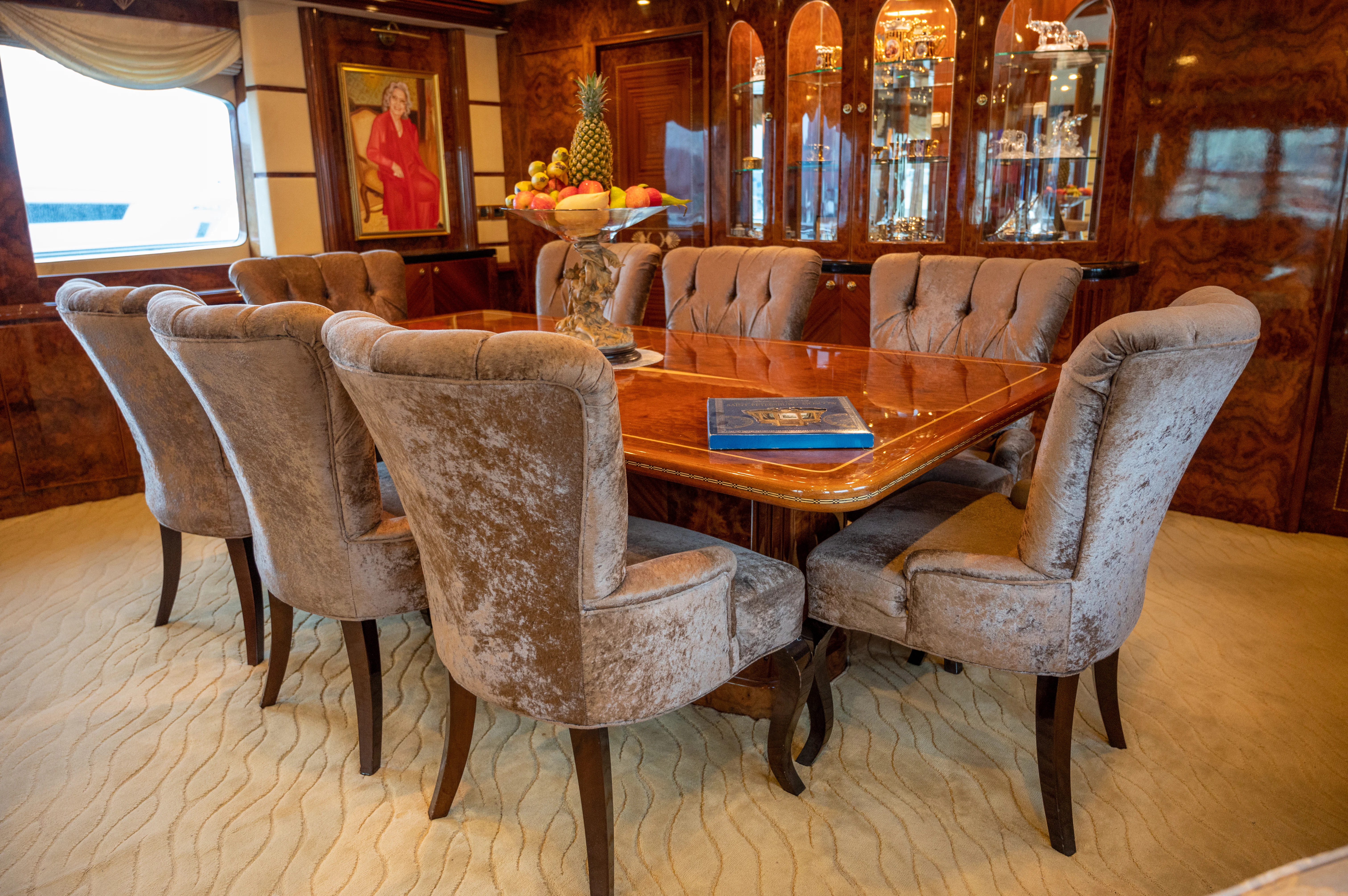 a room with a table and chairs aboard LADY EILEEN II Yacht for Sale