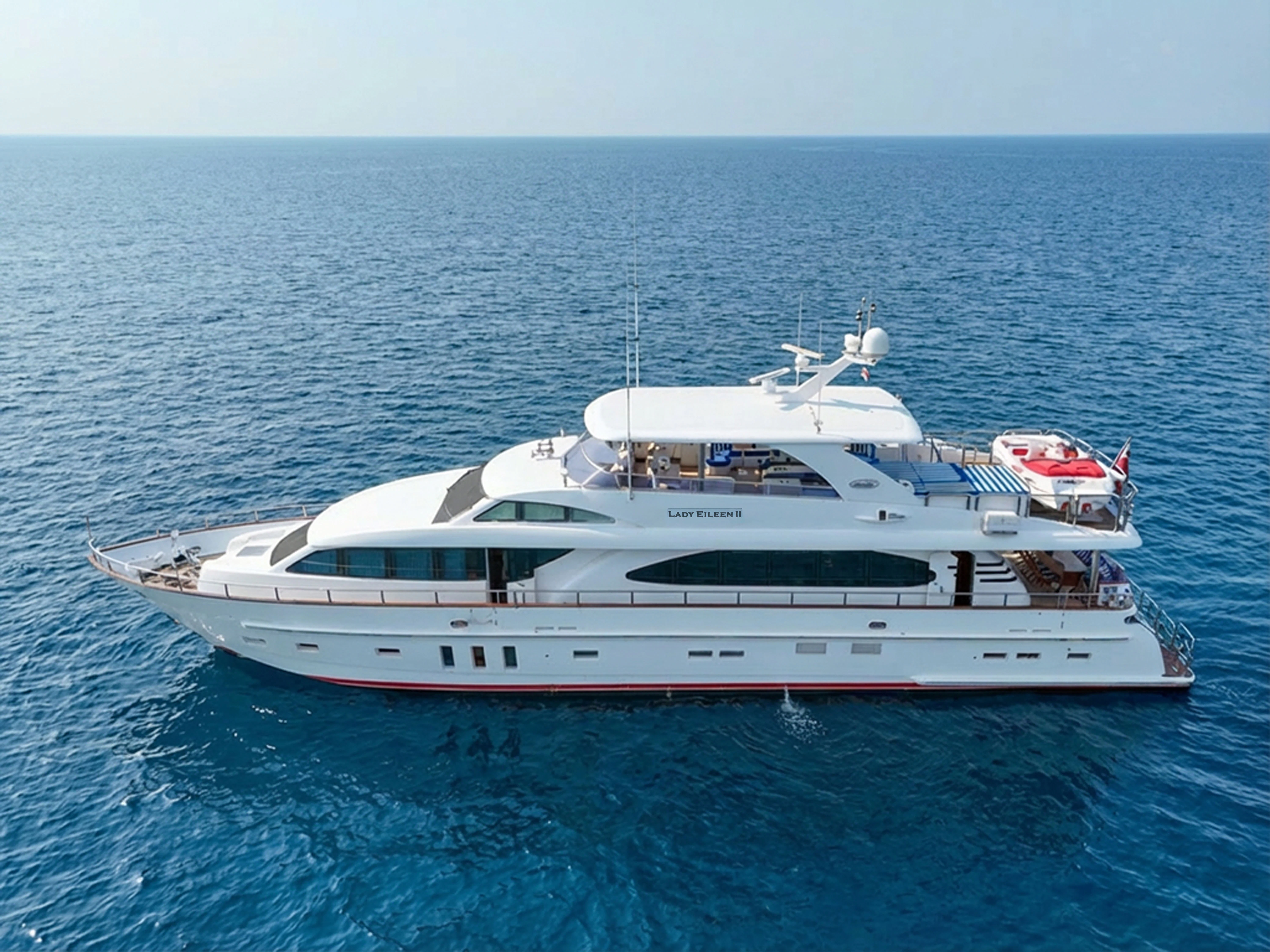 a white yacht in the water aboard LADY EILEEN II Yacht for Sale