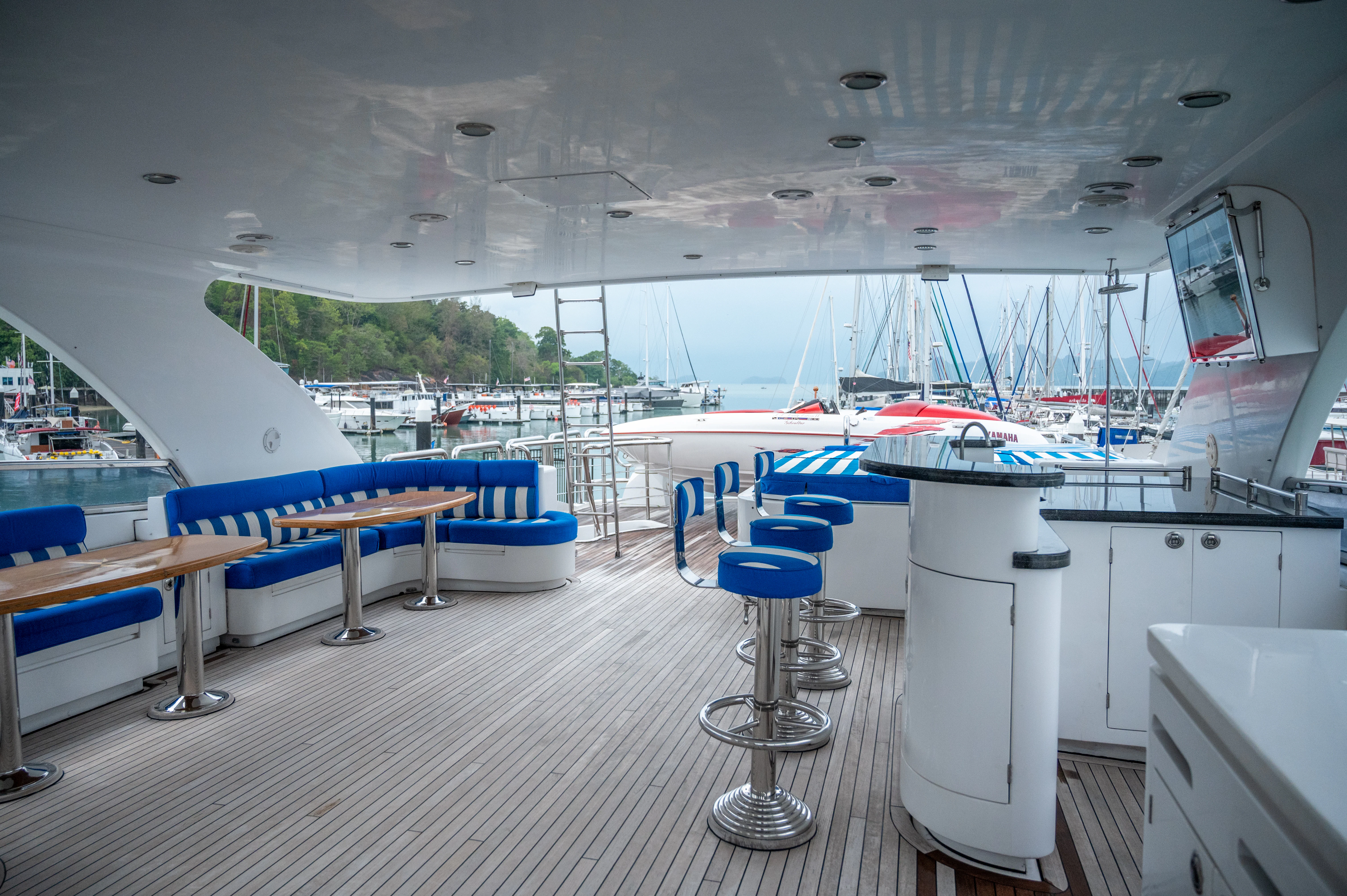 a boat dock with a view of the water and boats aboard LADY EILEEN II Yacht for Sale