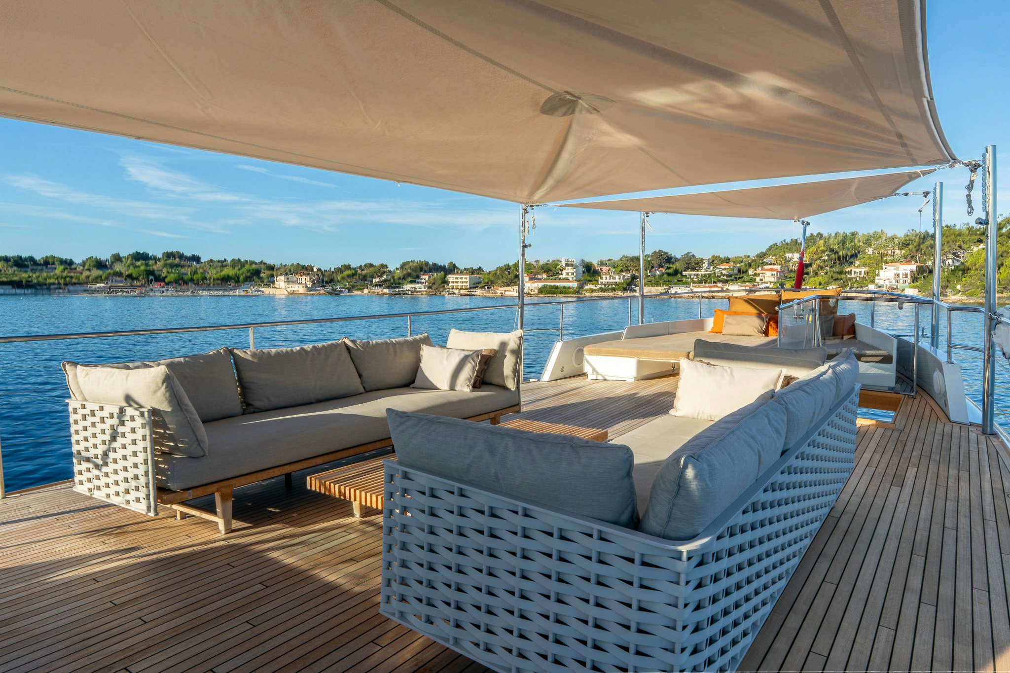 a large patio with couches aboard SULTANA Yacht for Sale