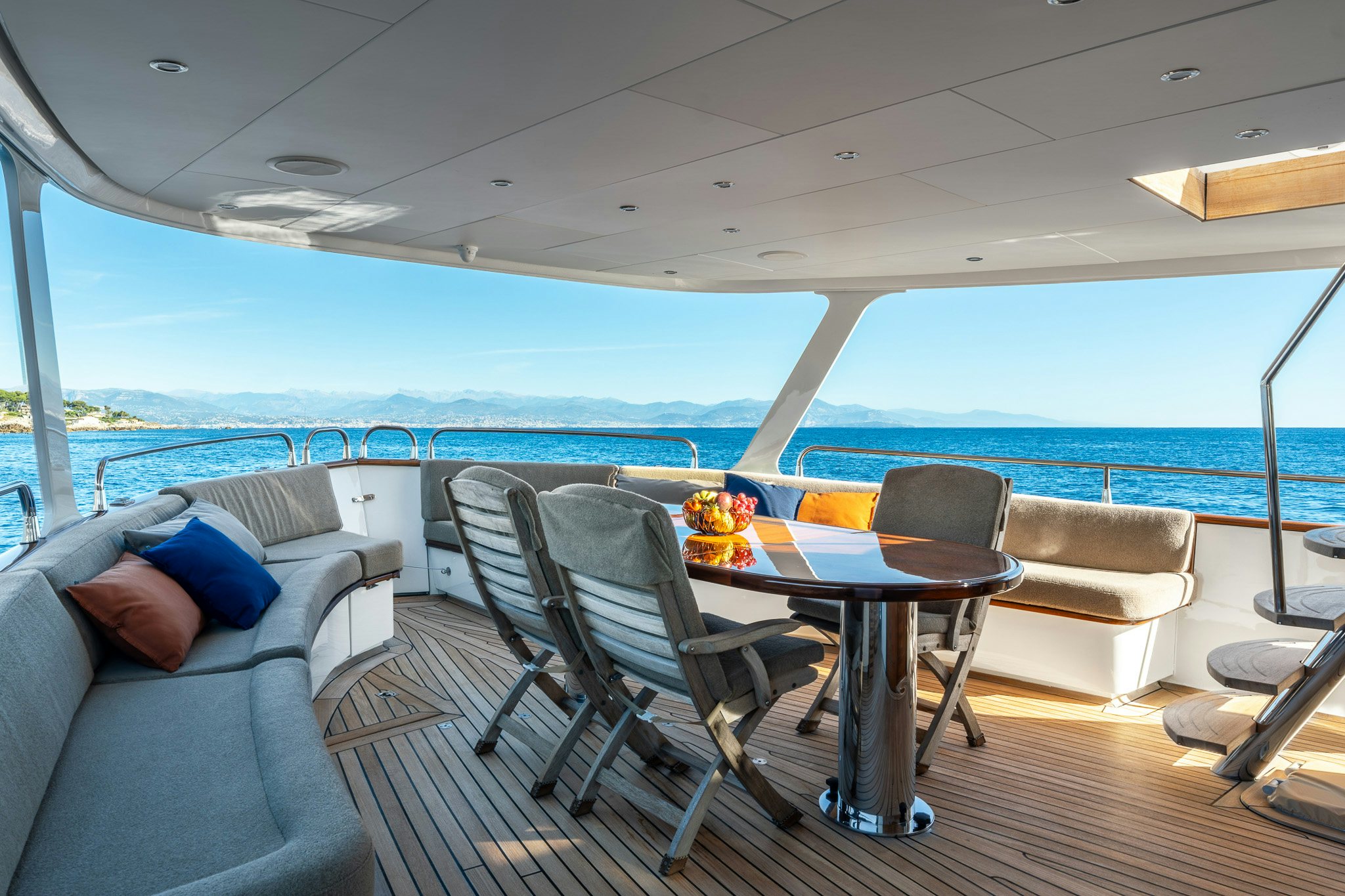 a table and chairs on a boat aboard SULTANA Yacht for Sale