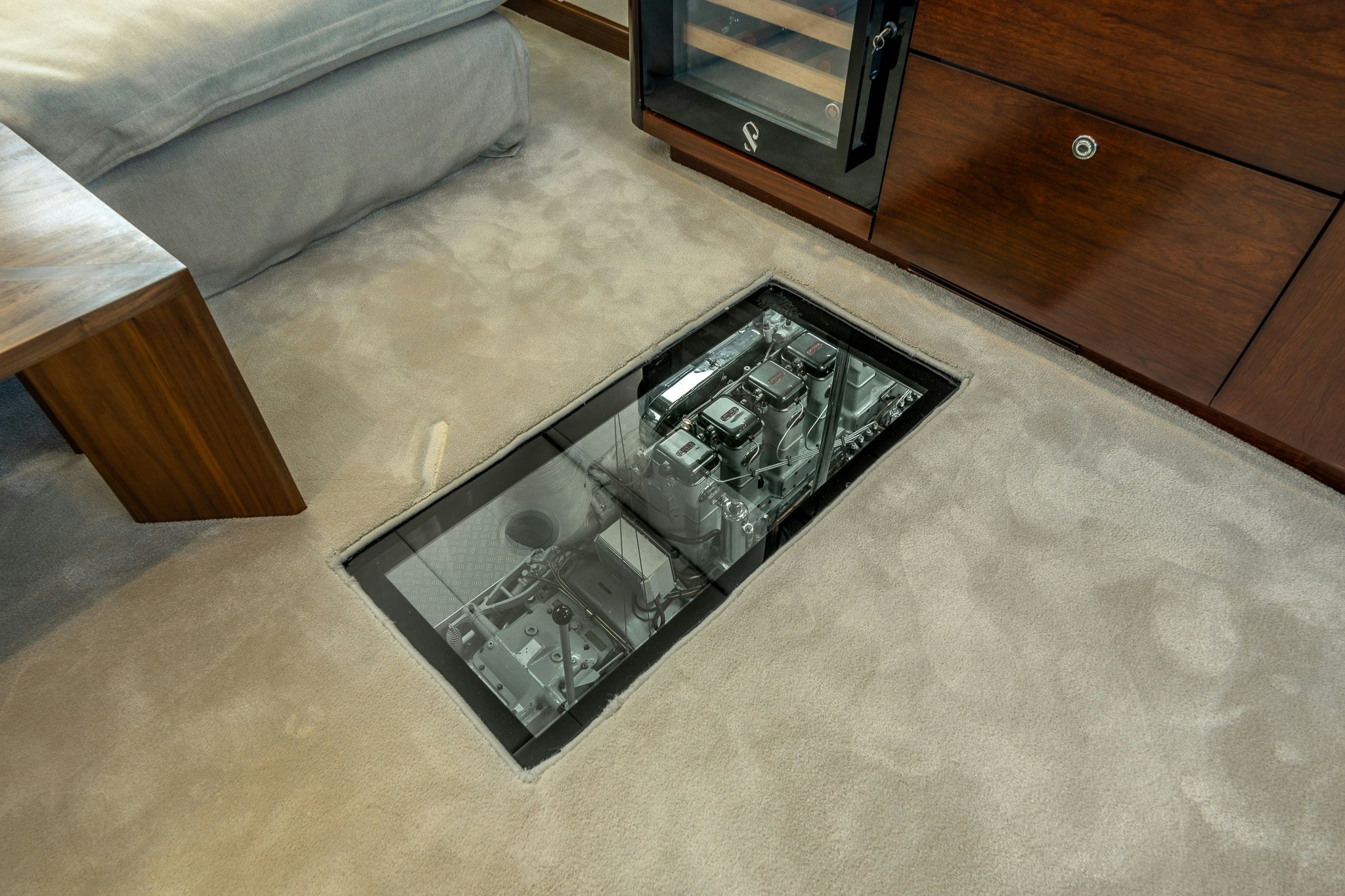 a black rectangular object on a carpet aboard SULTANA Yacht for Sale