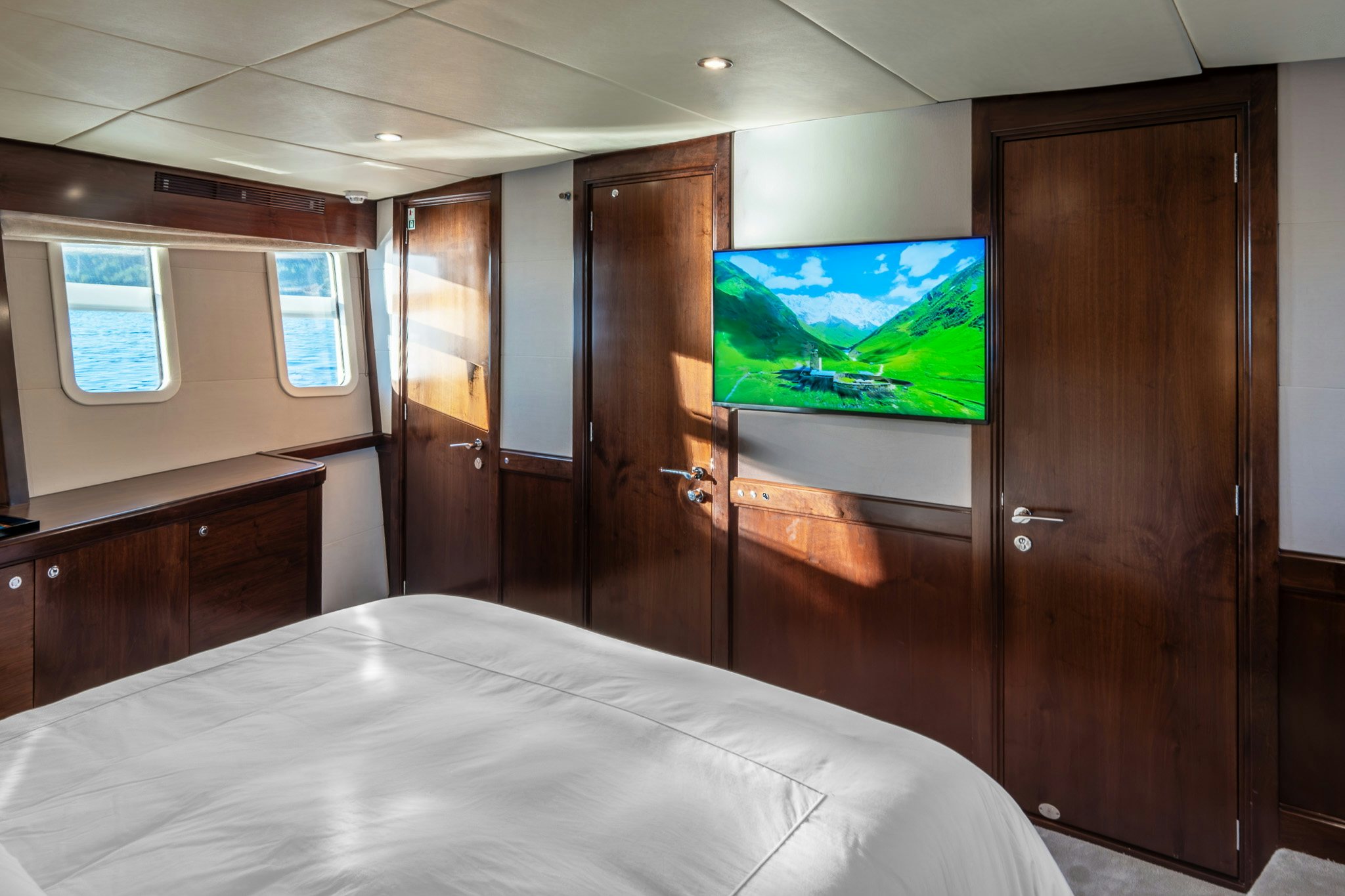 a bed in a room aboard SULTANA Yacht for Sale