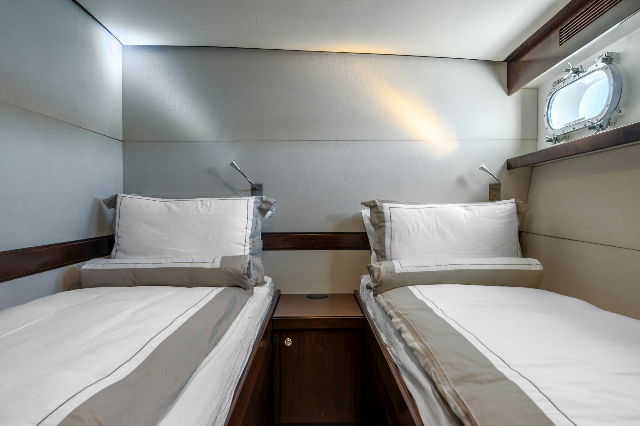 a couple of beds in a room aboard SULTANA Yacht for Sale