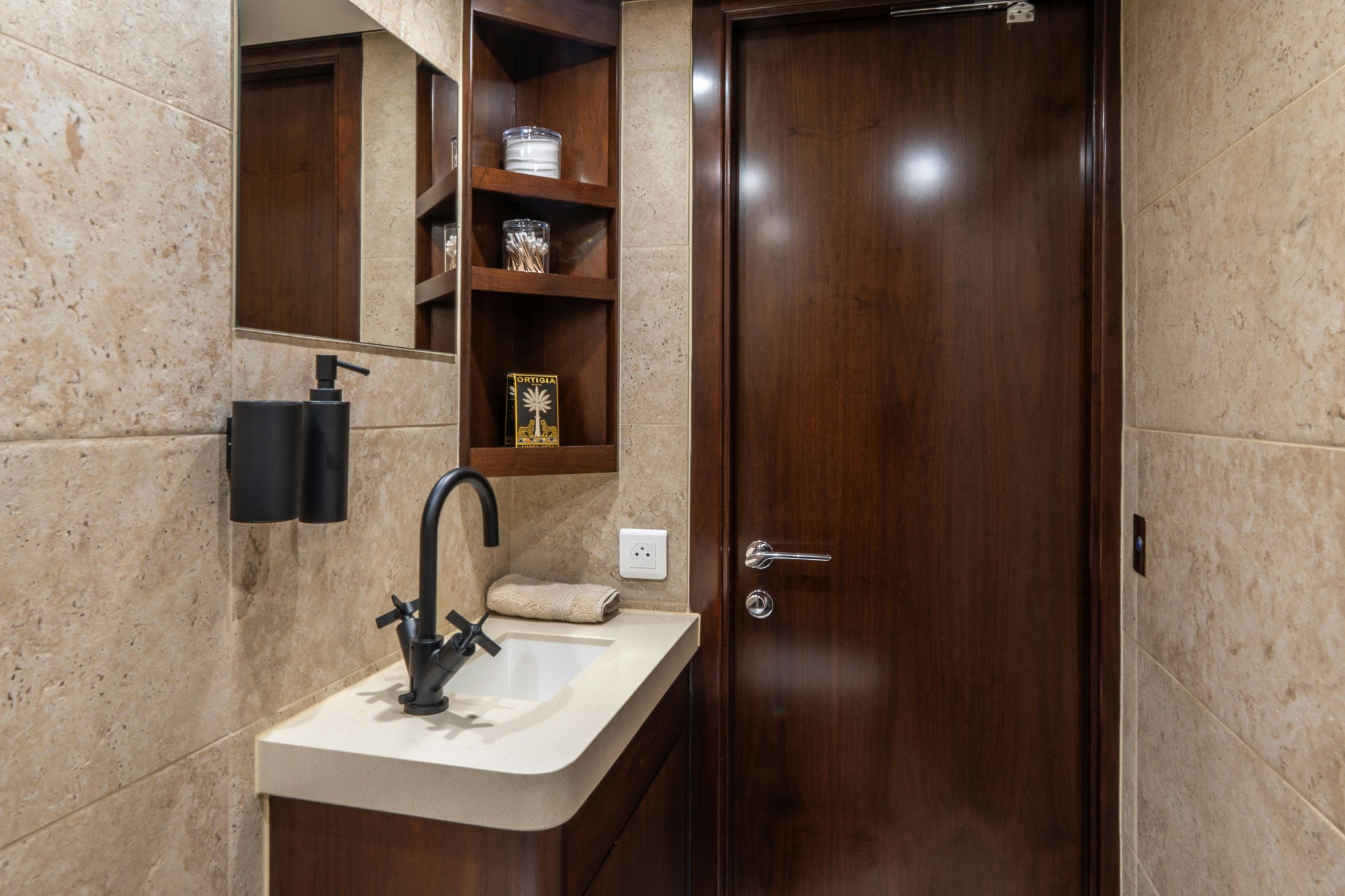 a bathroom with a sink and a cabinet aboard SULTANA Yacht for Sale