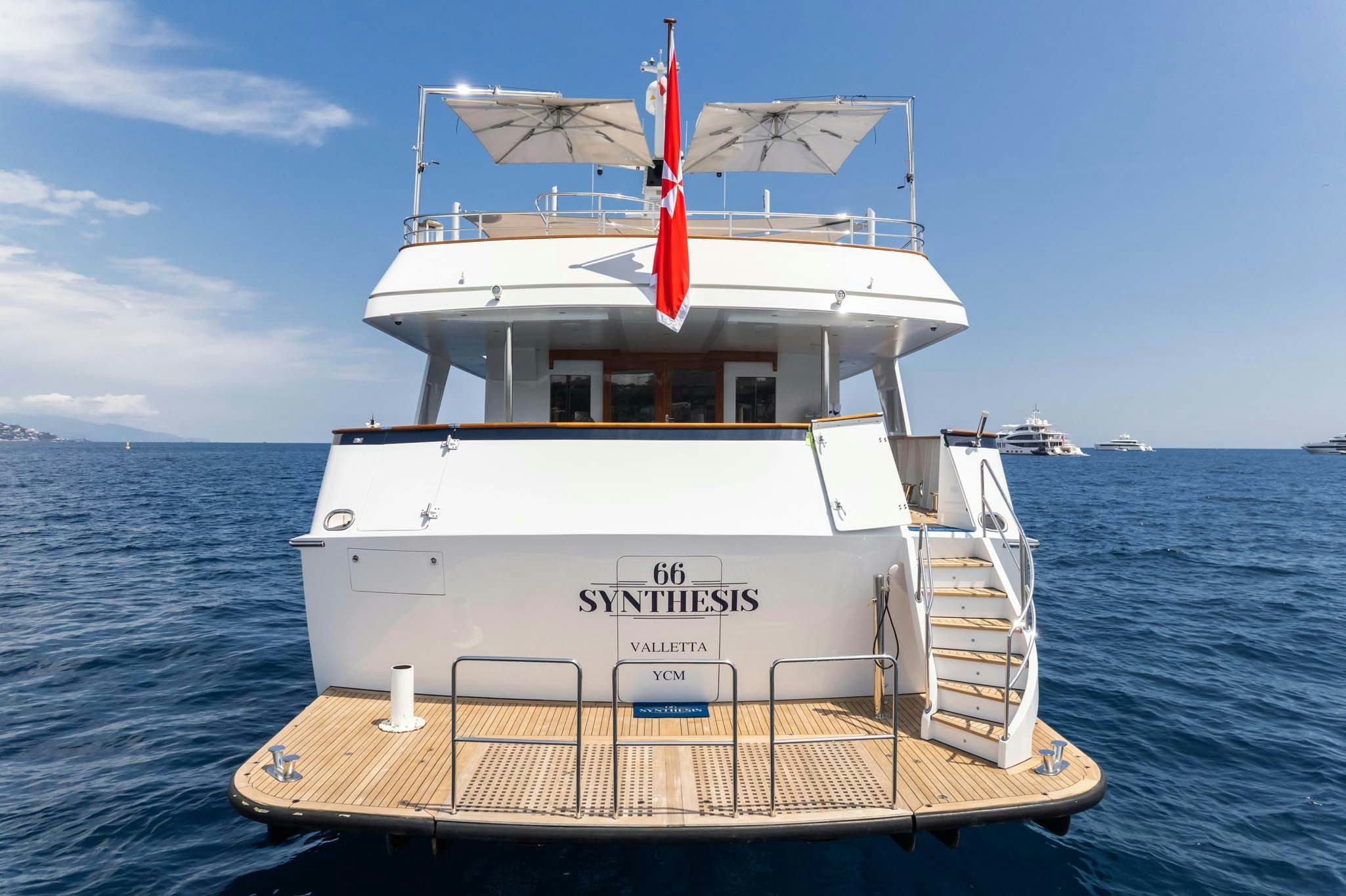 a boat on the water aboard SYNTHESIS 66 Yacht for Charter