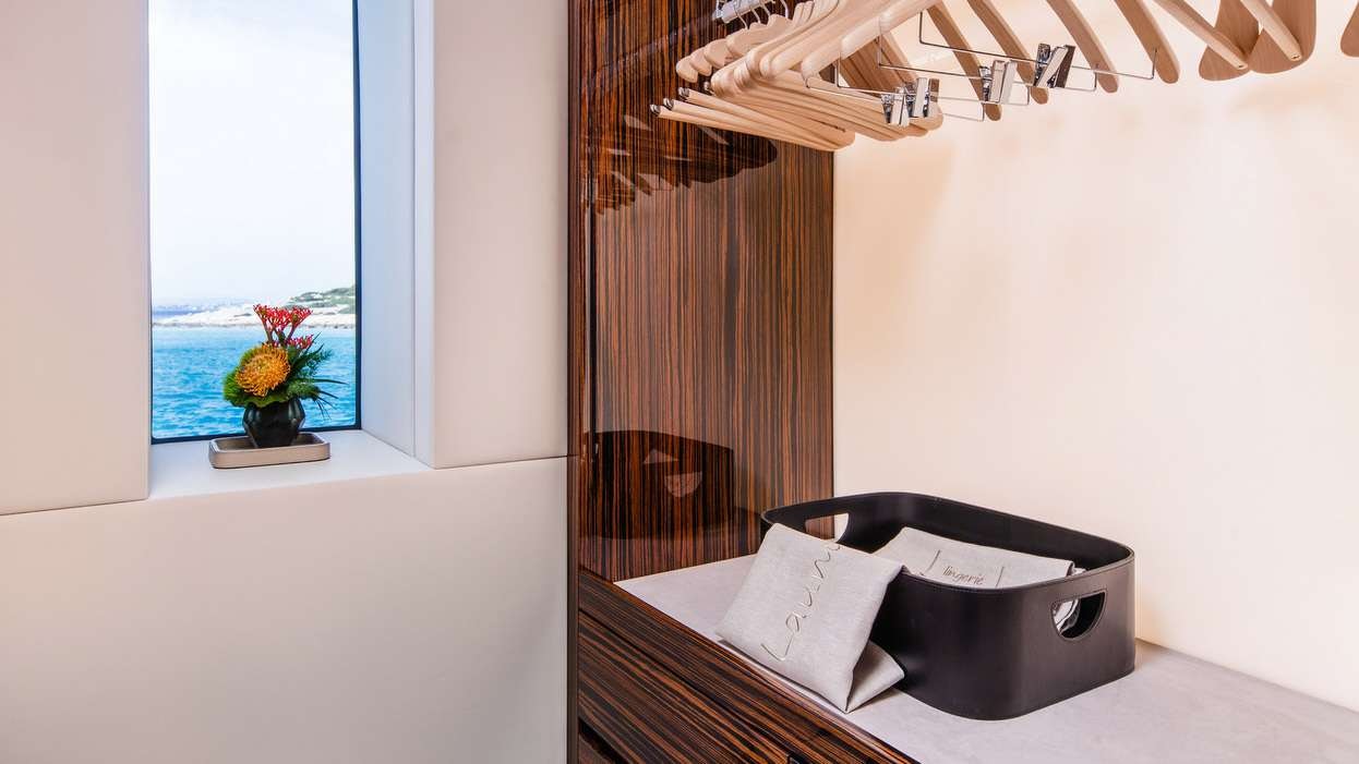 a bed in a room aboard GECO Yacht for Charter