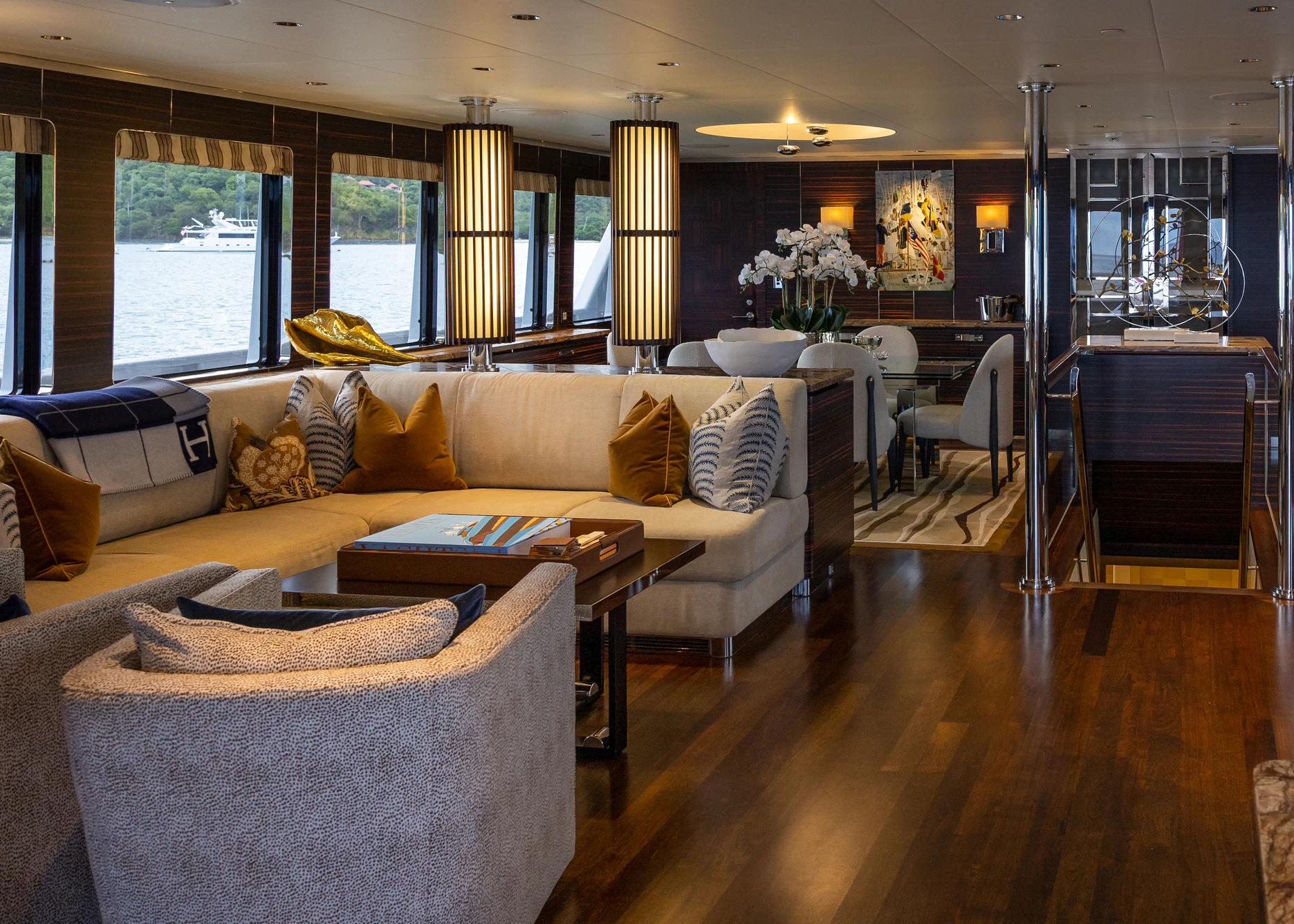 a living room with a large window aboard AVALON Yacht for Charter