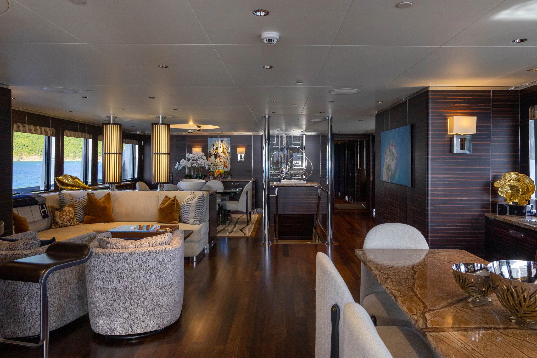 a living room with a large window aboard AVALON Yacht for Charter