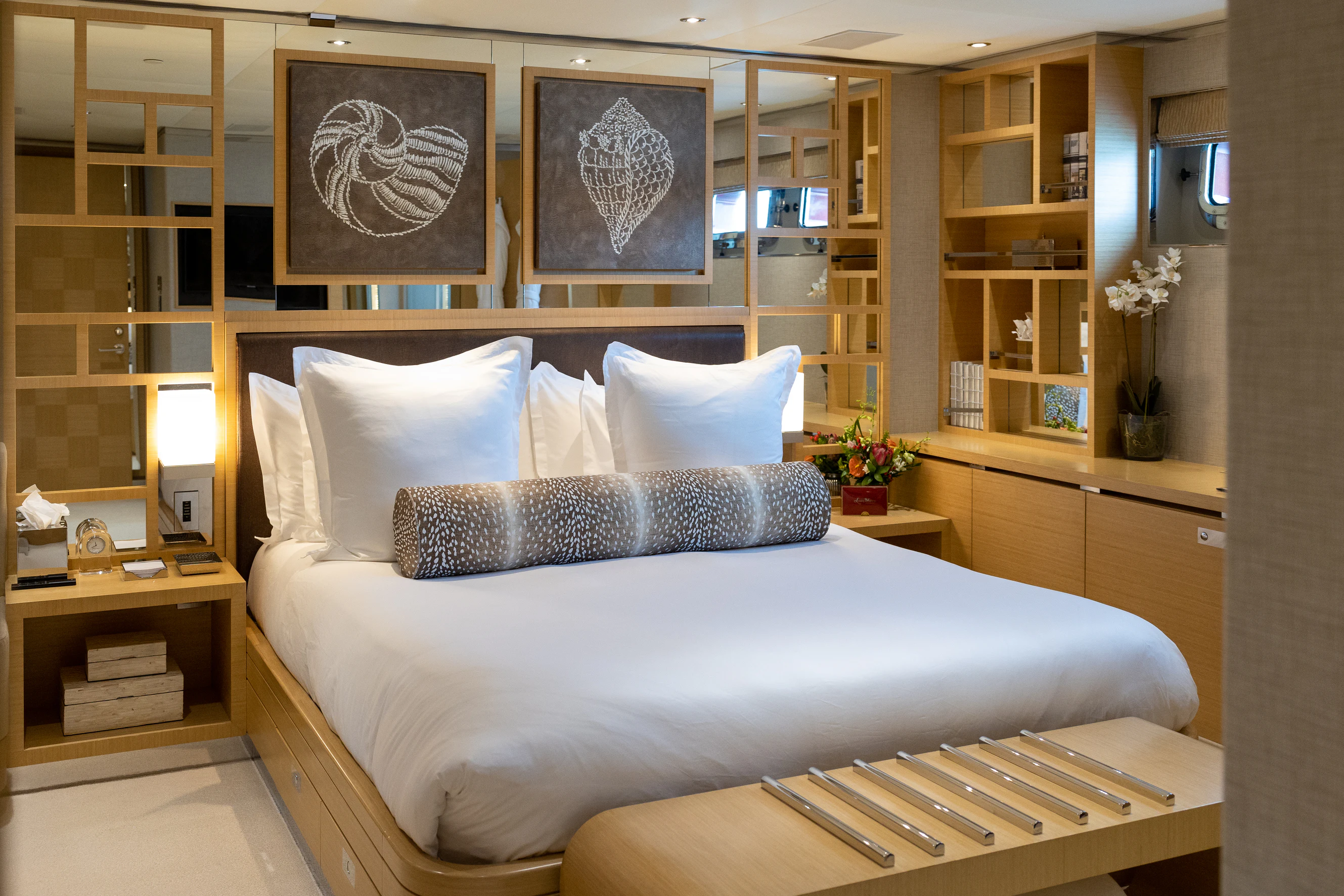 a bed in a room aboard AVALON Yacht for Charter