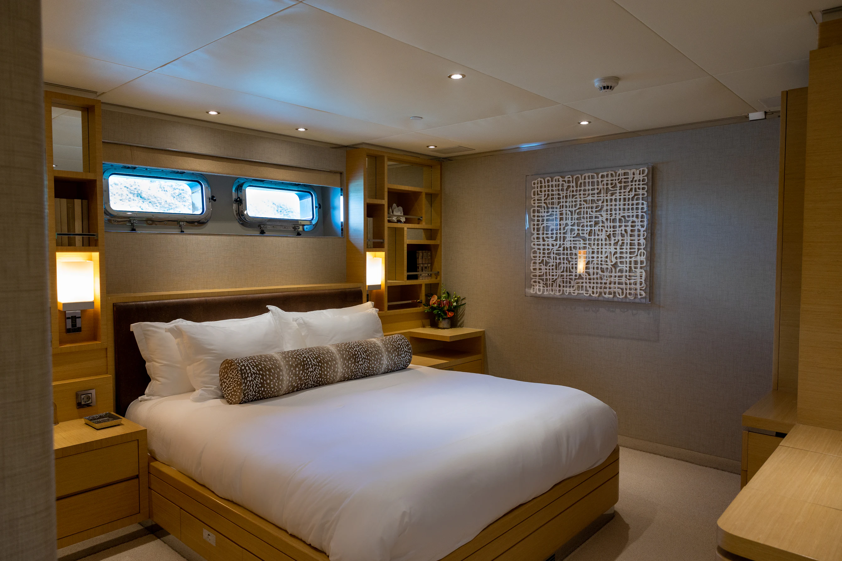 a hotel room with a bed aboard AVALON Yacht for Charter