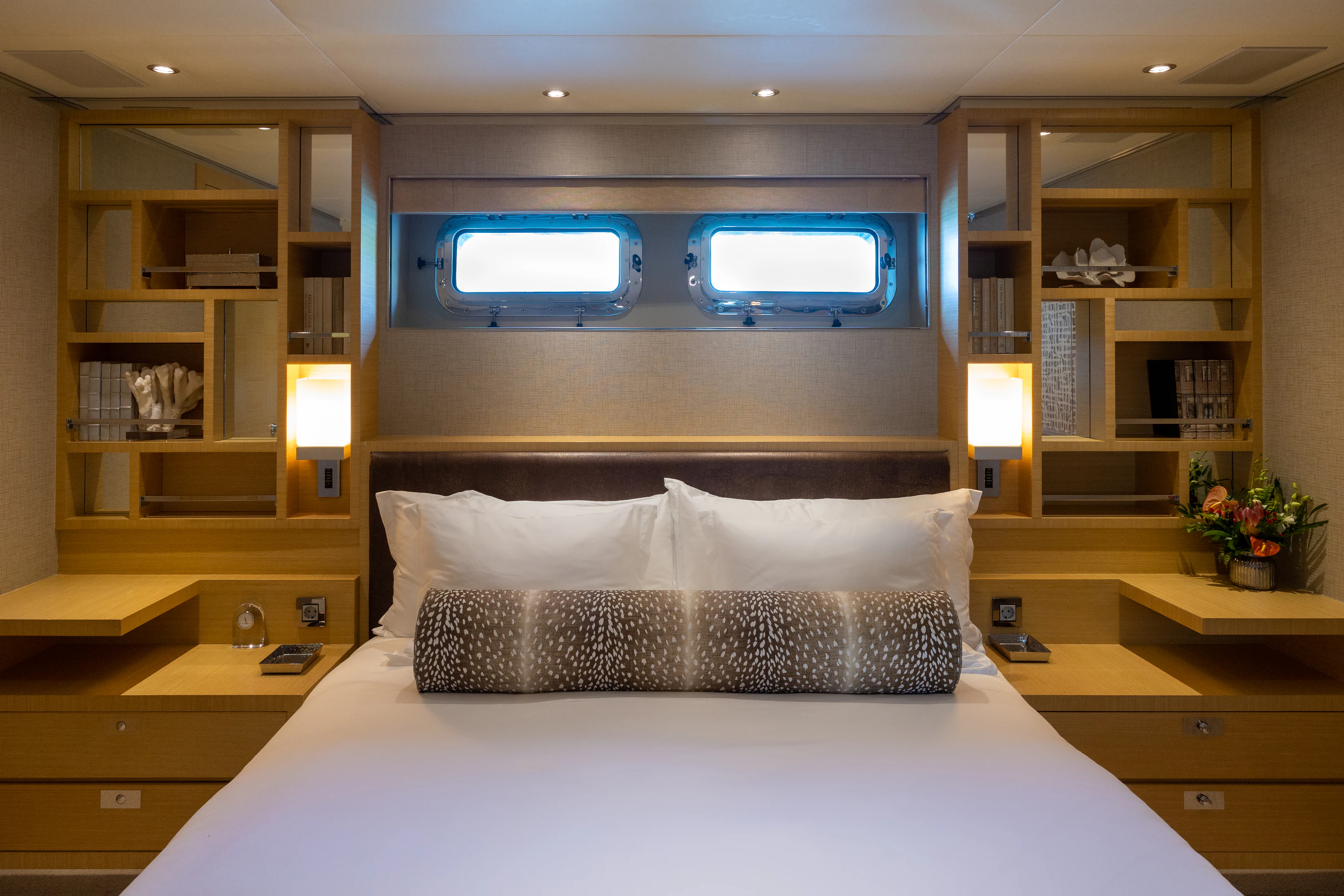 a bed in a room aboard AVALON Yacht for Charter