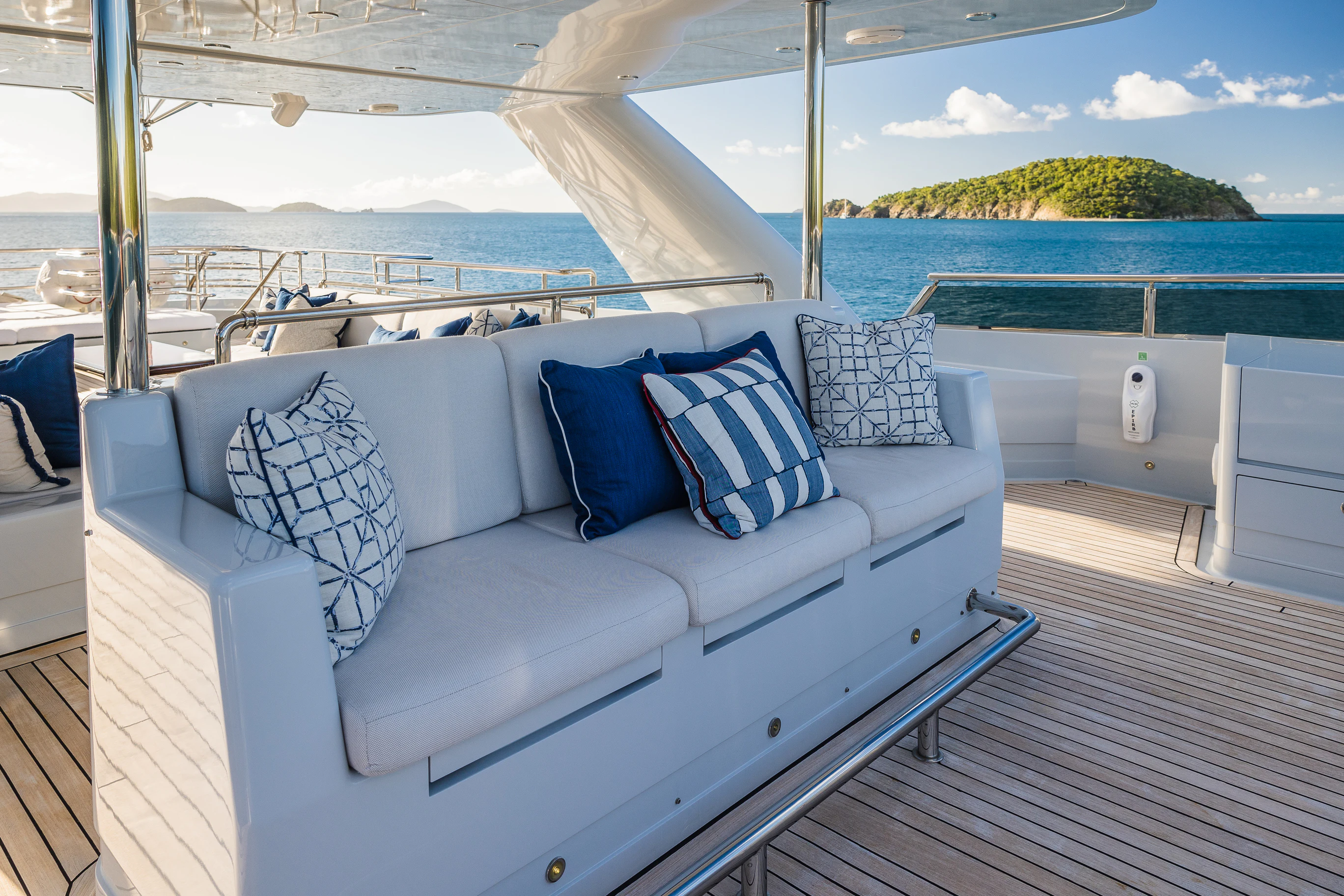 a couch on a deck aboard AVALON Yacht for Charter