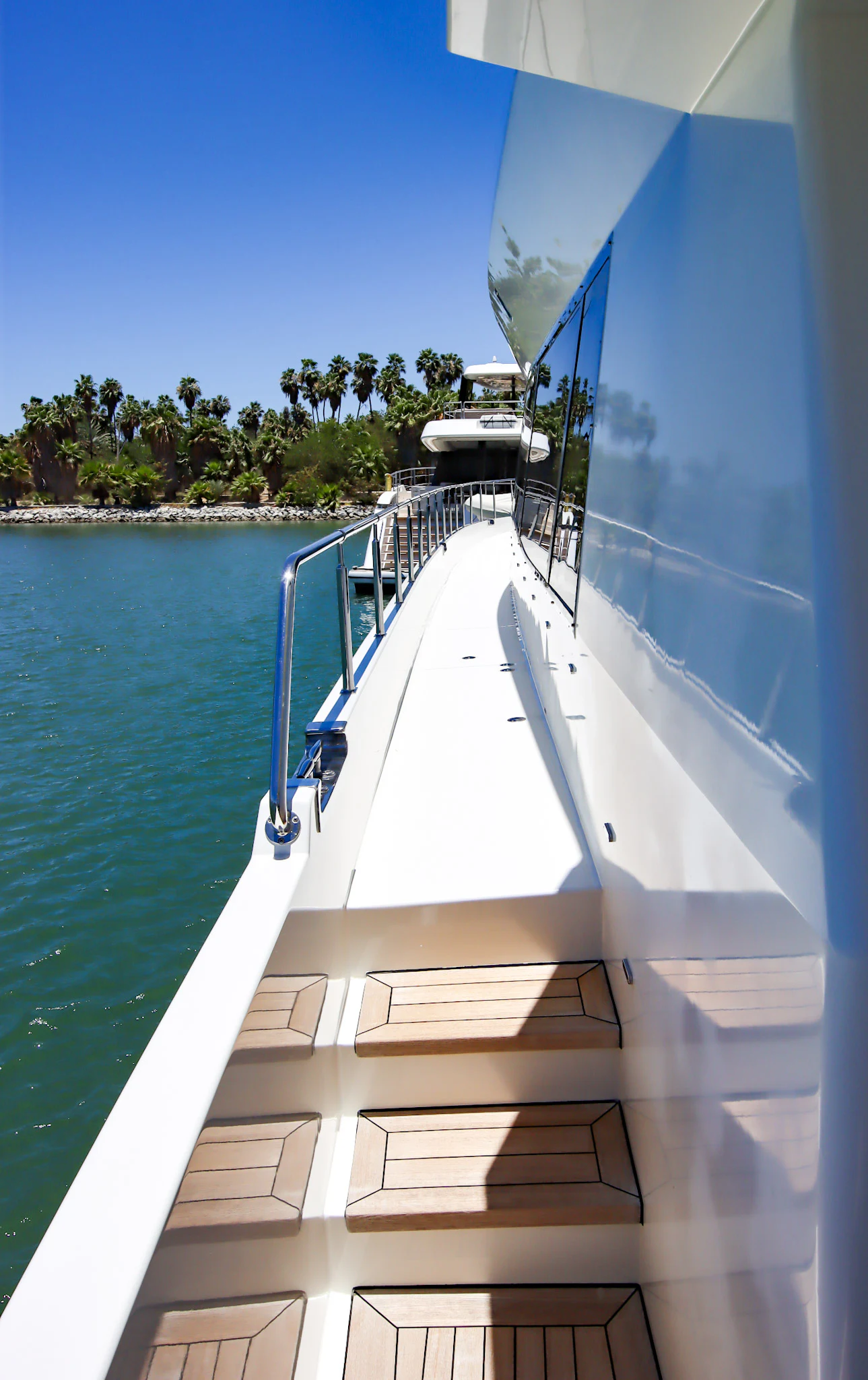 a white boat on a body of water aboard MARDIOSA Yacht for Sale