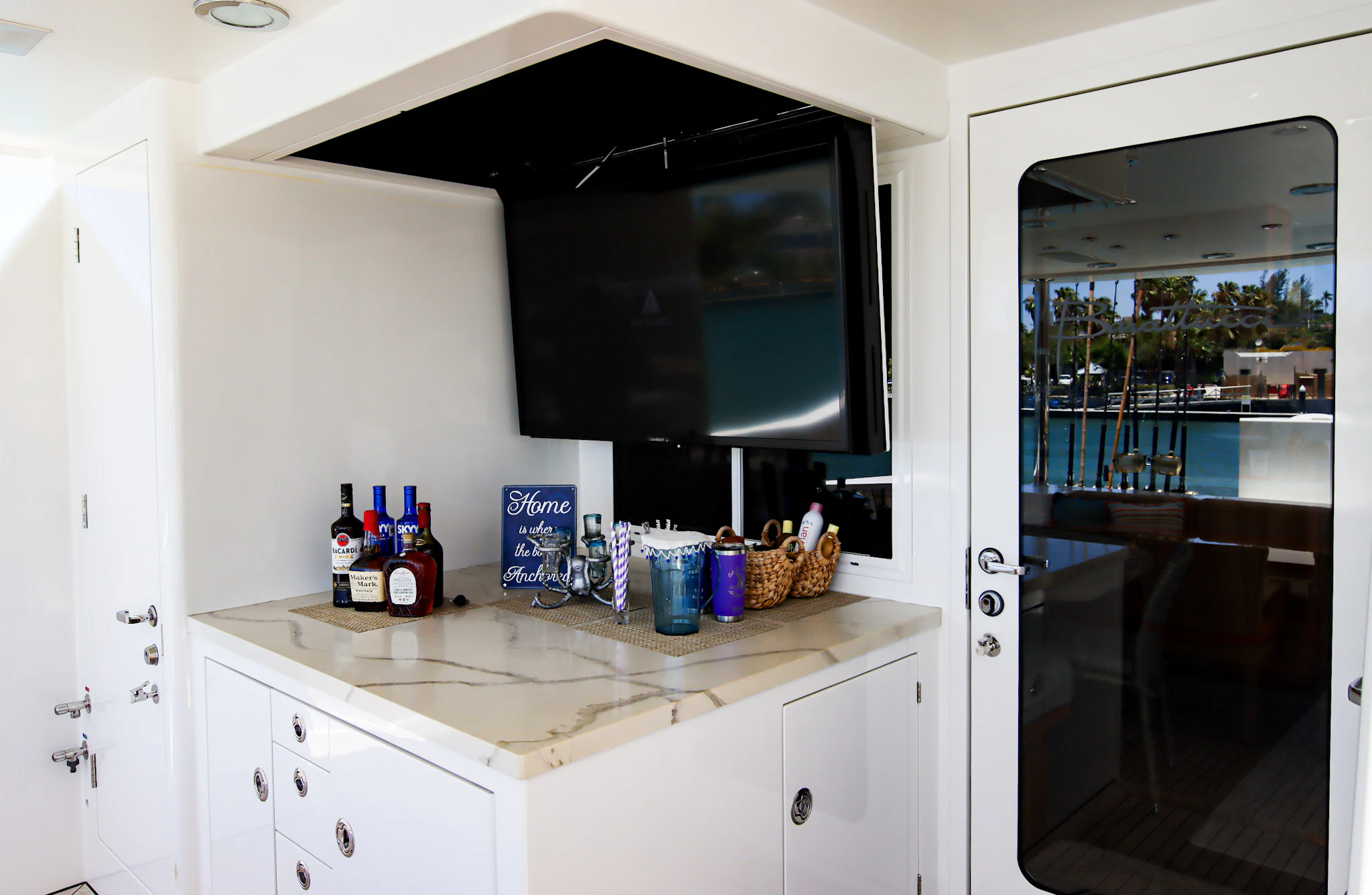 a kitchen with a large window aboard MARDIOSA Yacht for Sale