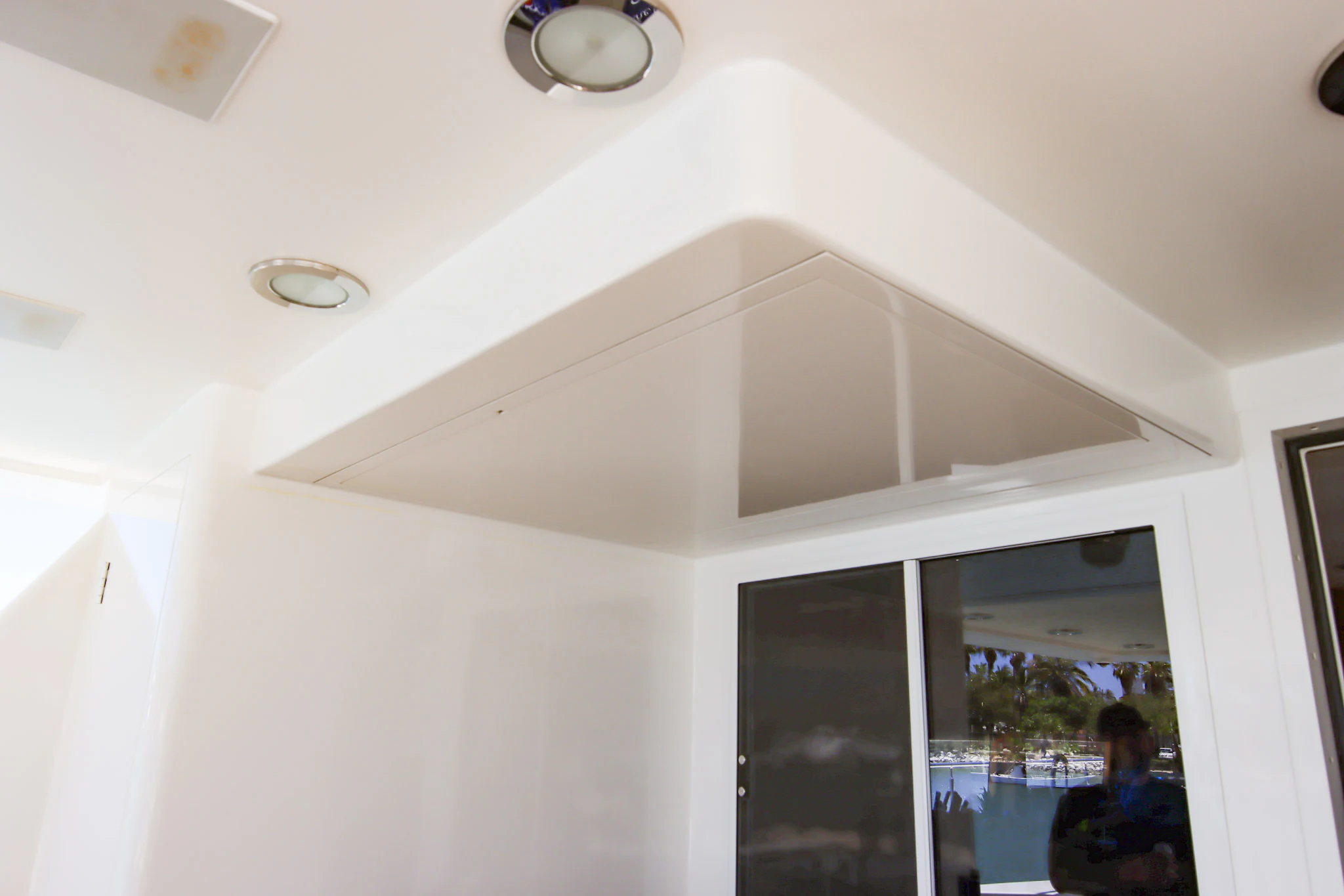 a white ceiling with a light fixture aboard MARDIOSA Yacht for Sale