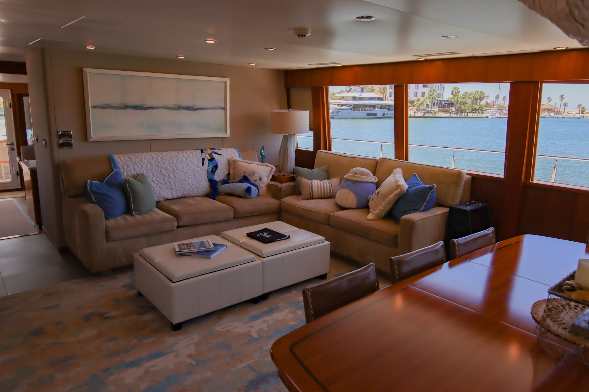 a living room with a large window aboard MARDIOSA Yacht for Sale