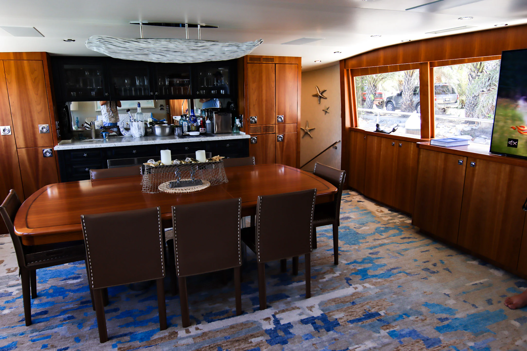 a dining table in a room aboard MARDIOSA Yacht for Sale