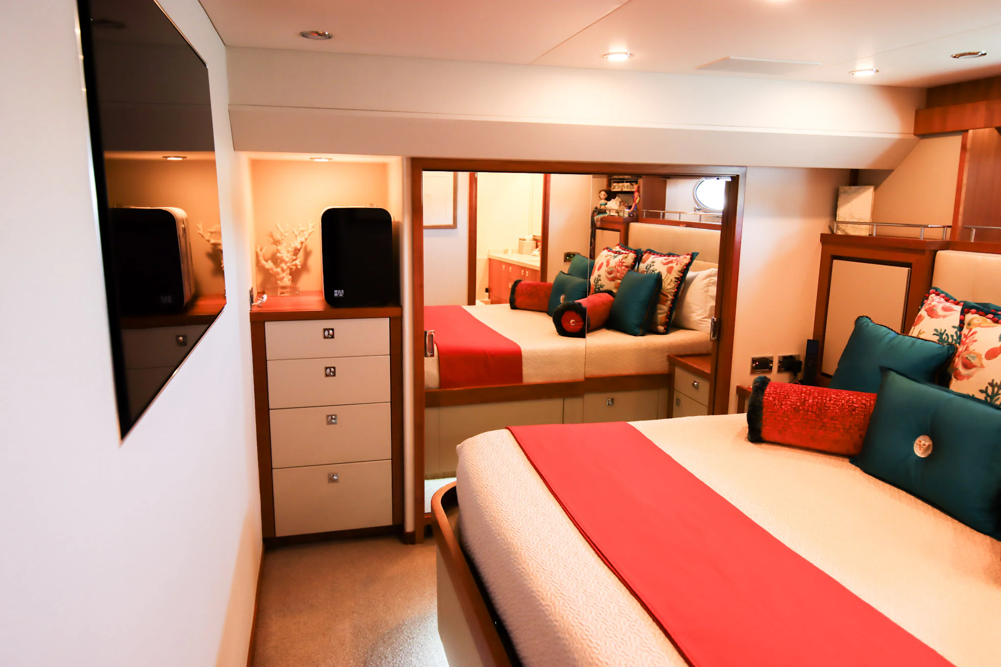 a bedroom with a bed and a tv aboard MARDIOSA Yacht for Sale