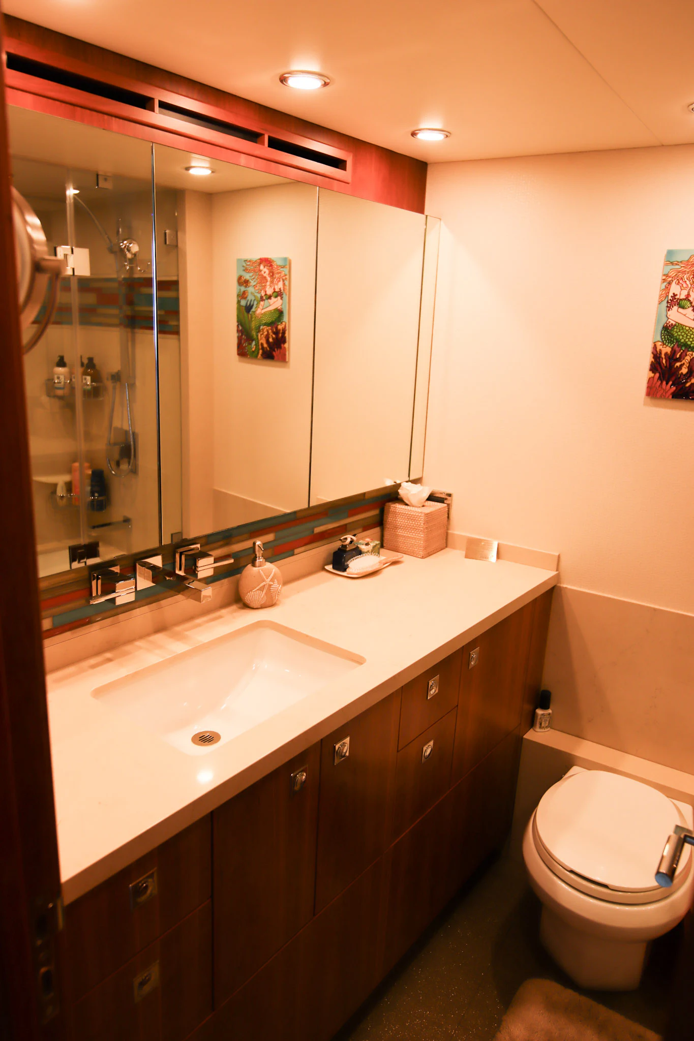 a bathroom with a large mirror aboard MARDIOSA Yacht for Sale