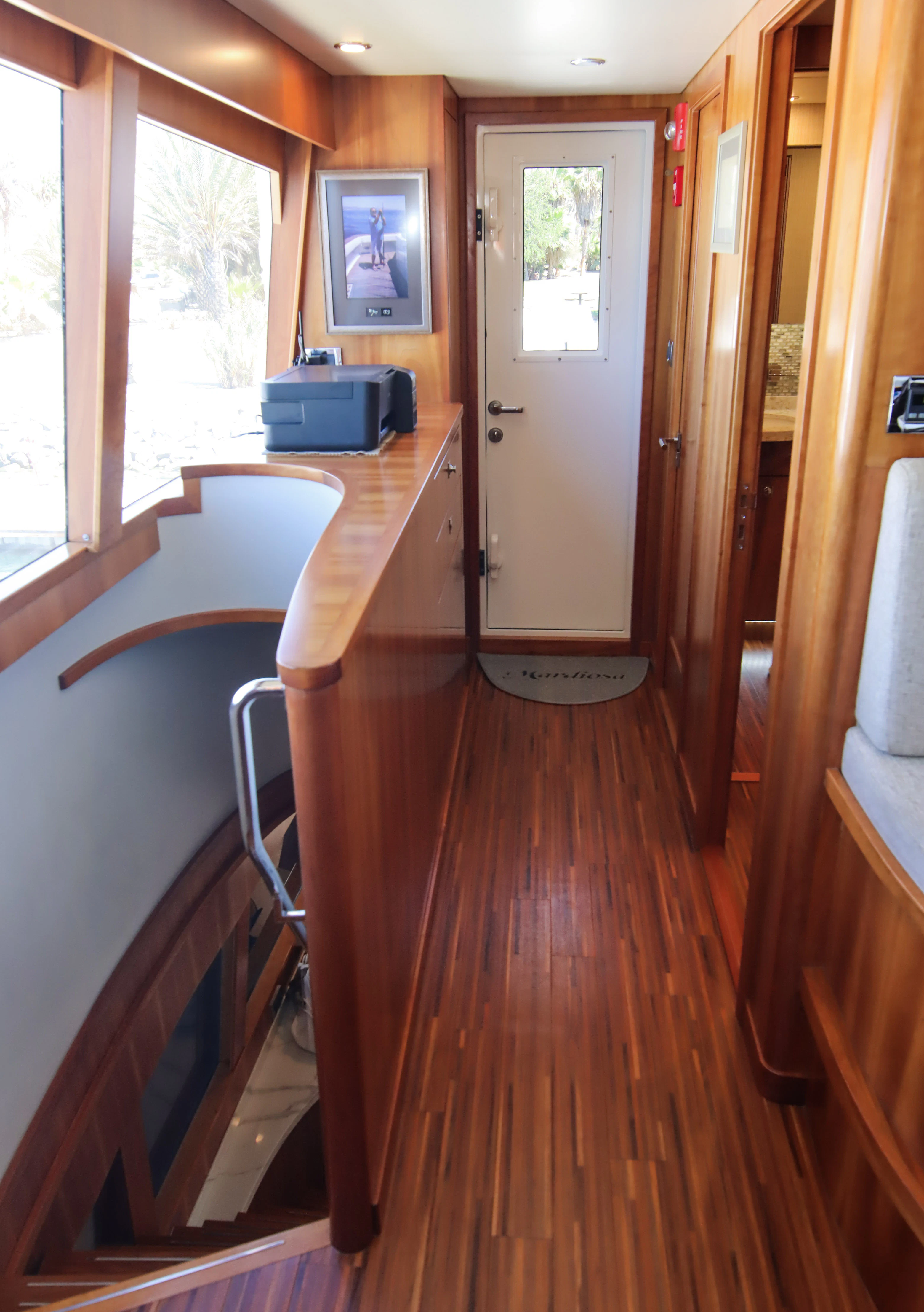 a bedroom with a bed and a desk aboard MARDIOSA Yacht for Sale