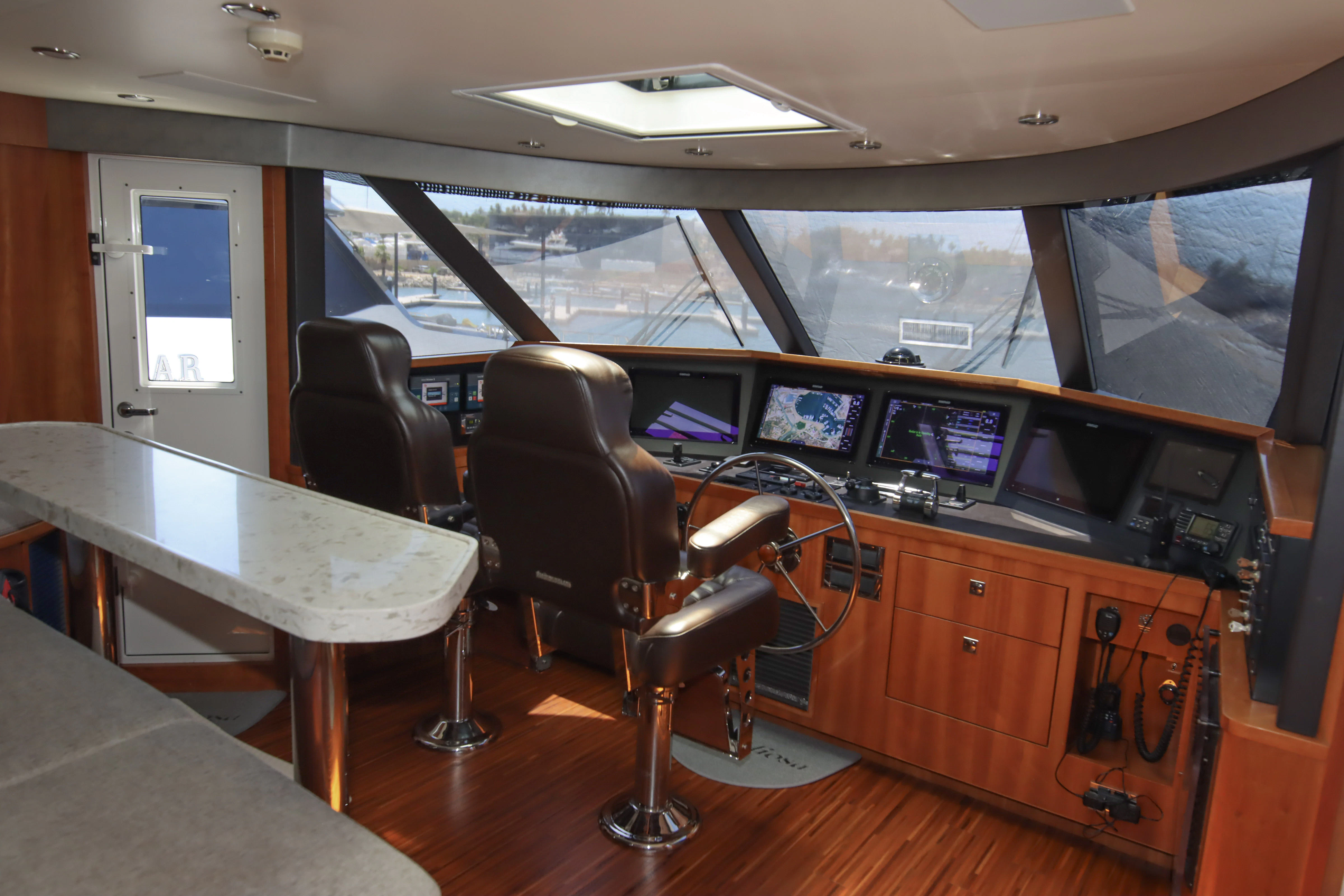 a room with a desk and a chair and a television aboard MARDIOSA Yacht for Sale