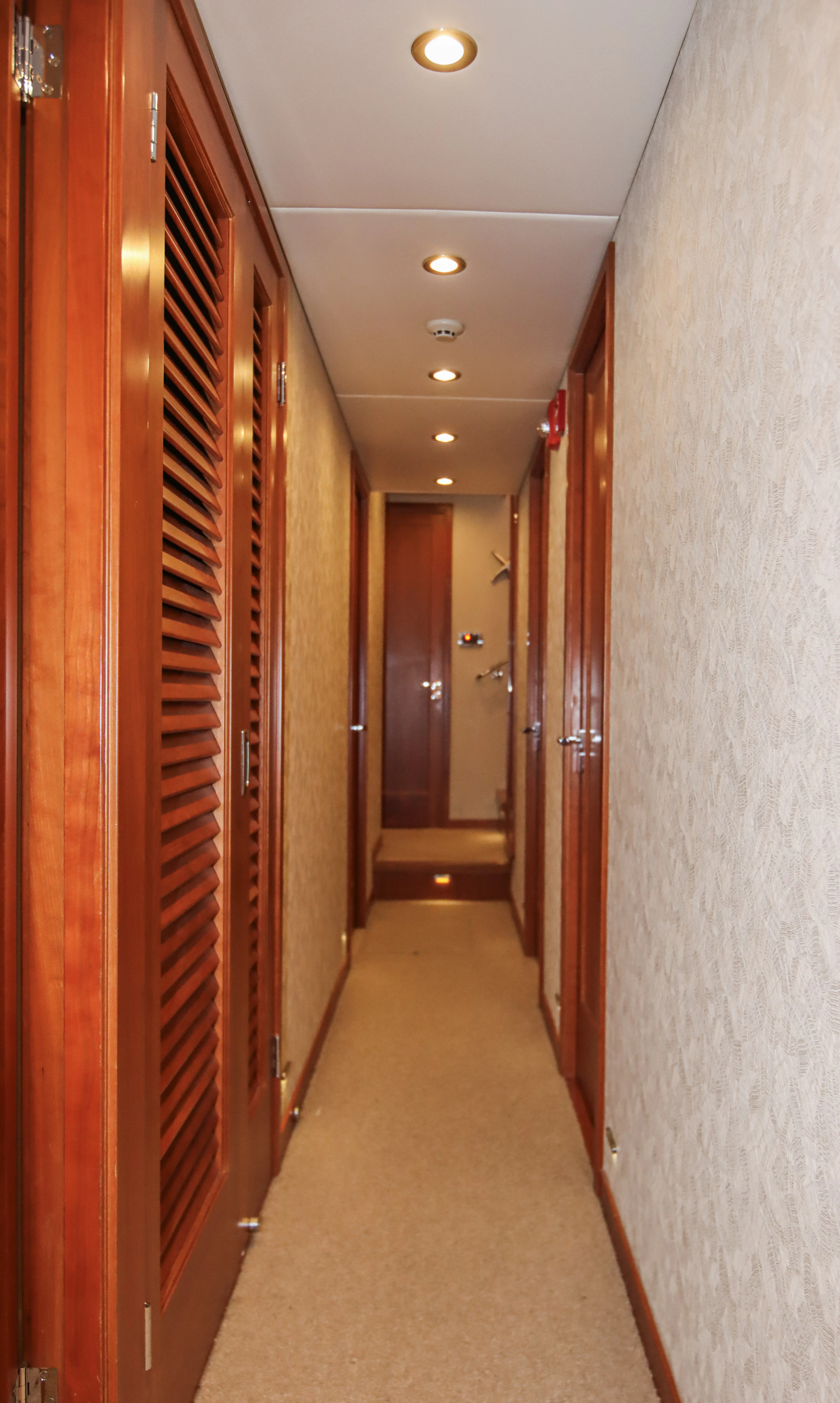 a hallway with doors aboard MARDIOSA Yacht for Sale