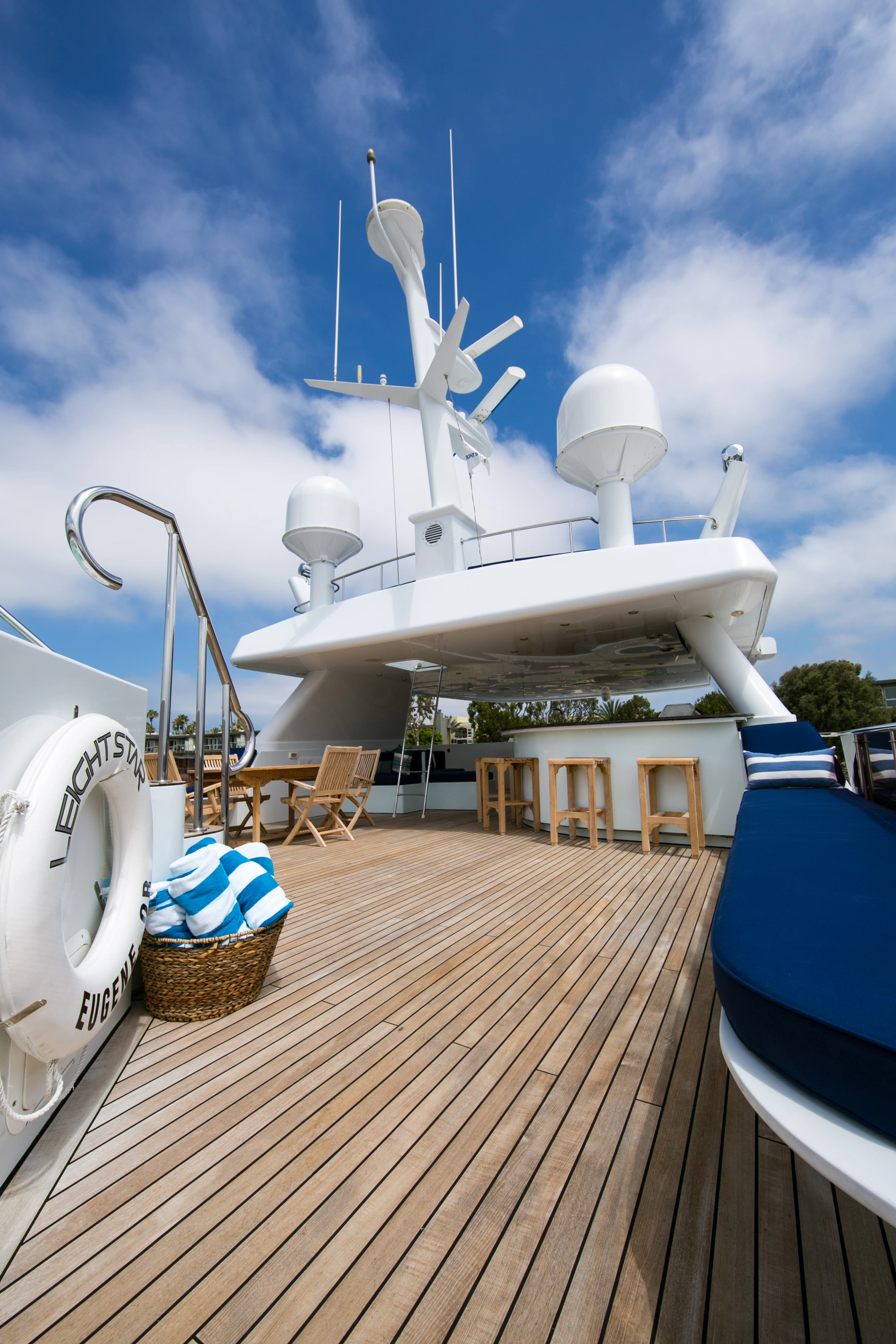 a white boat on a dock aboard AURORA Yacht for Sale