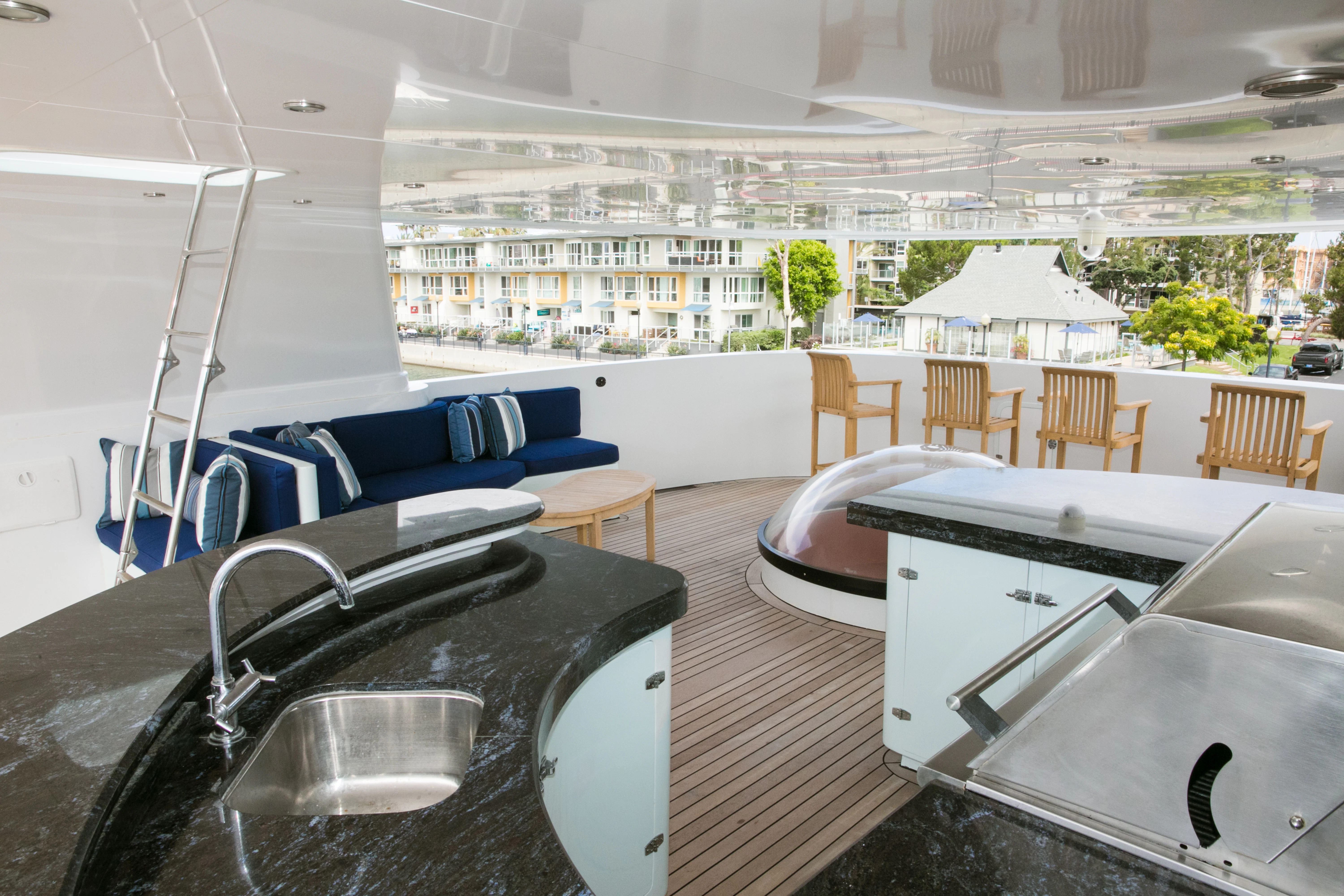 a large kitchen with a large window aboard AURORA Yacht for Sale