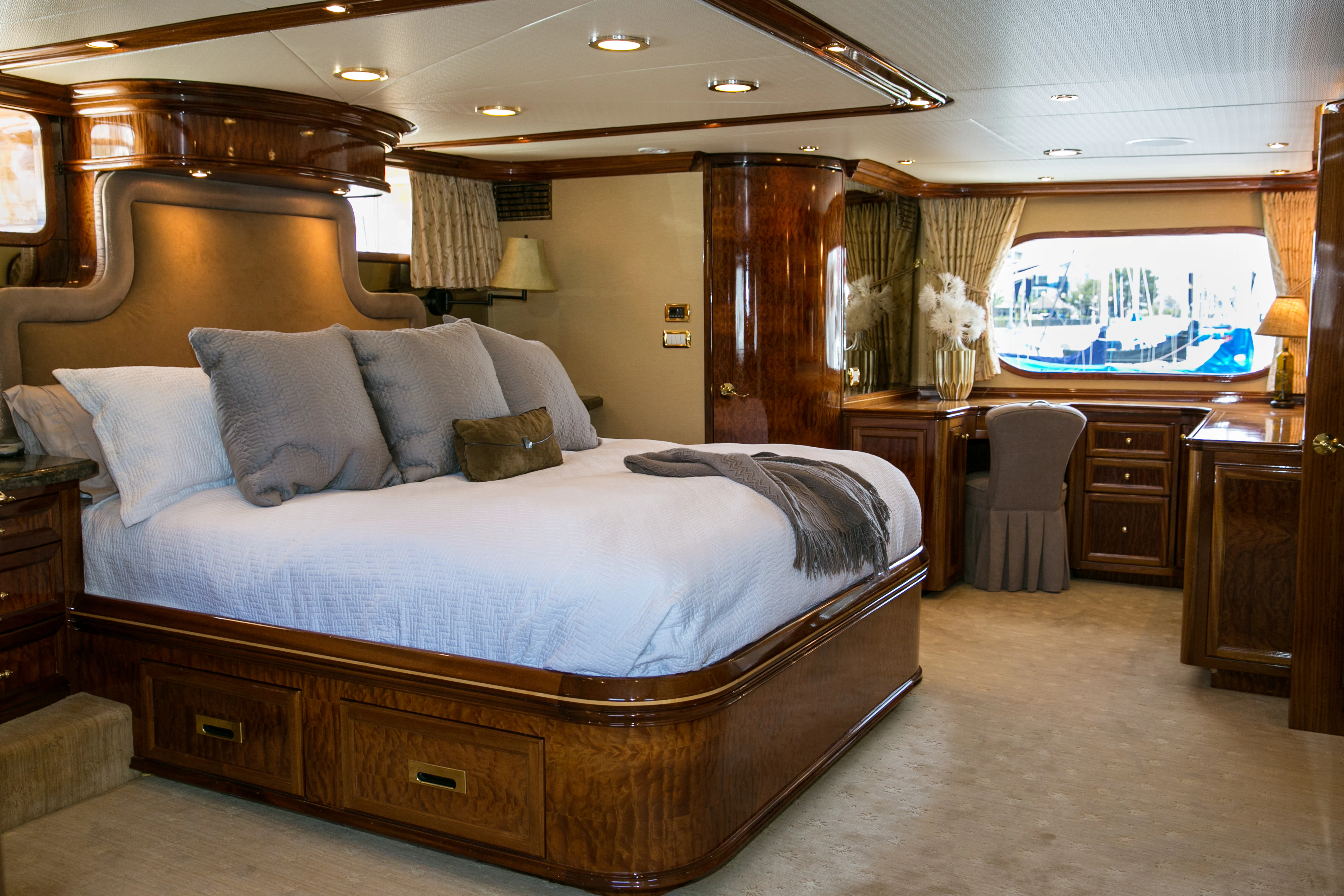 a large bed in a hotel room aboard AURORA Yacht for Sale