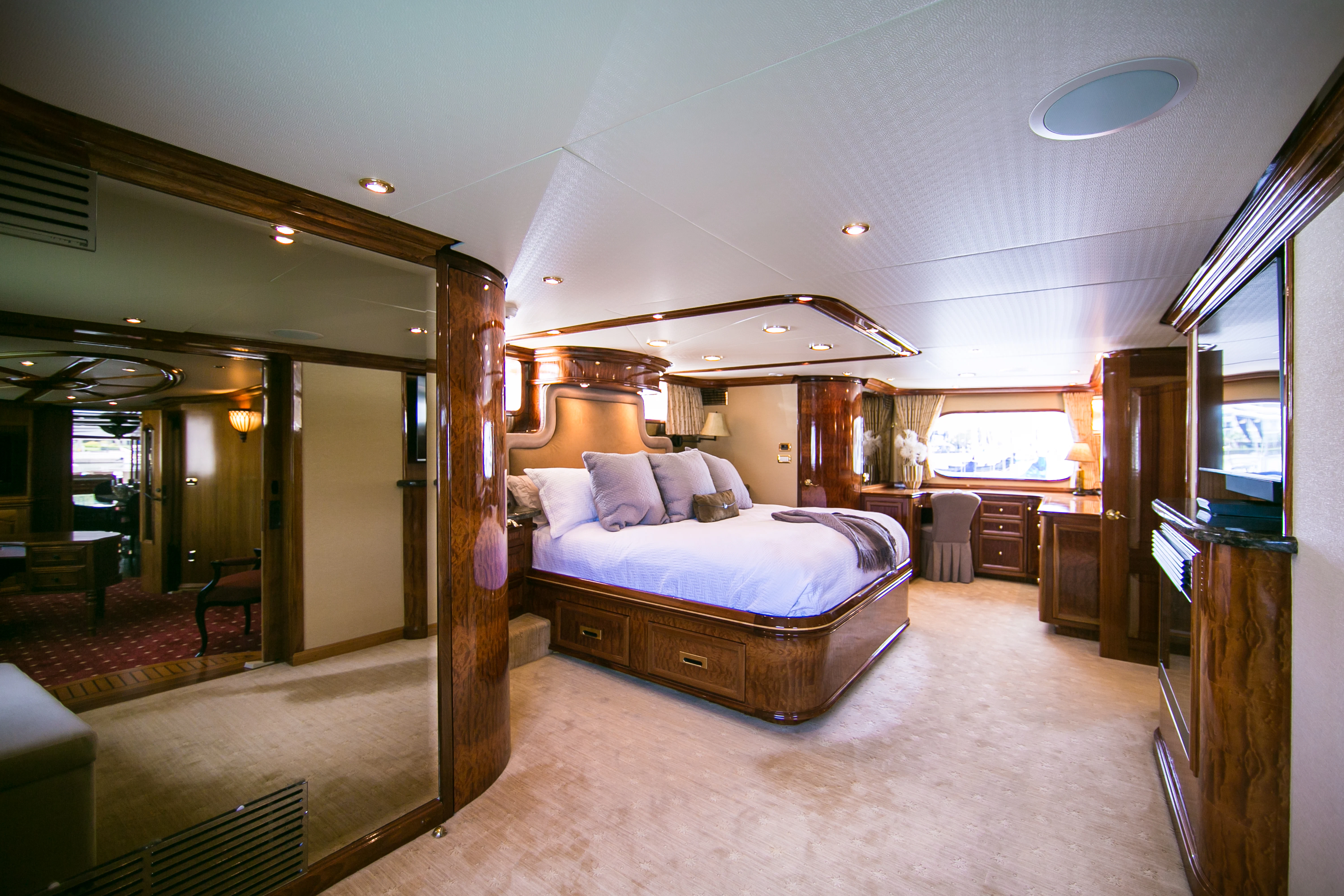 a bedroom with a large bed aboard AURORA Yacht for Sale
