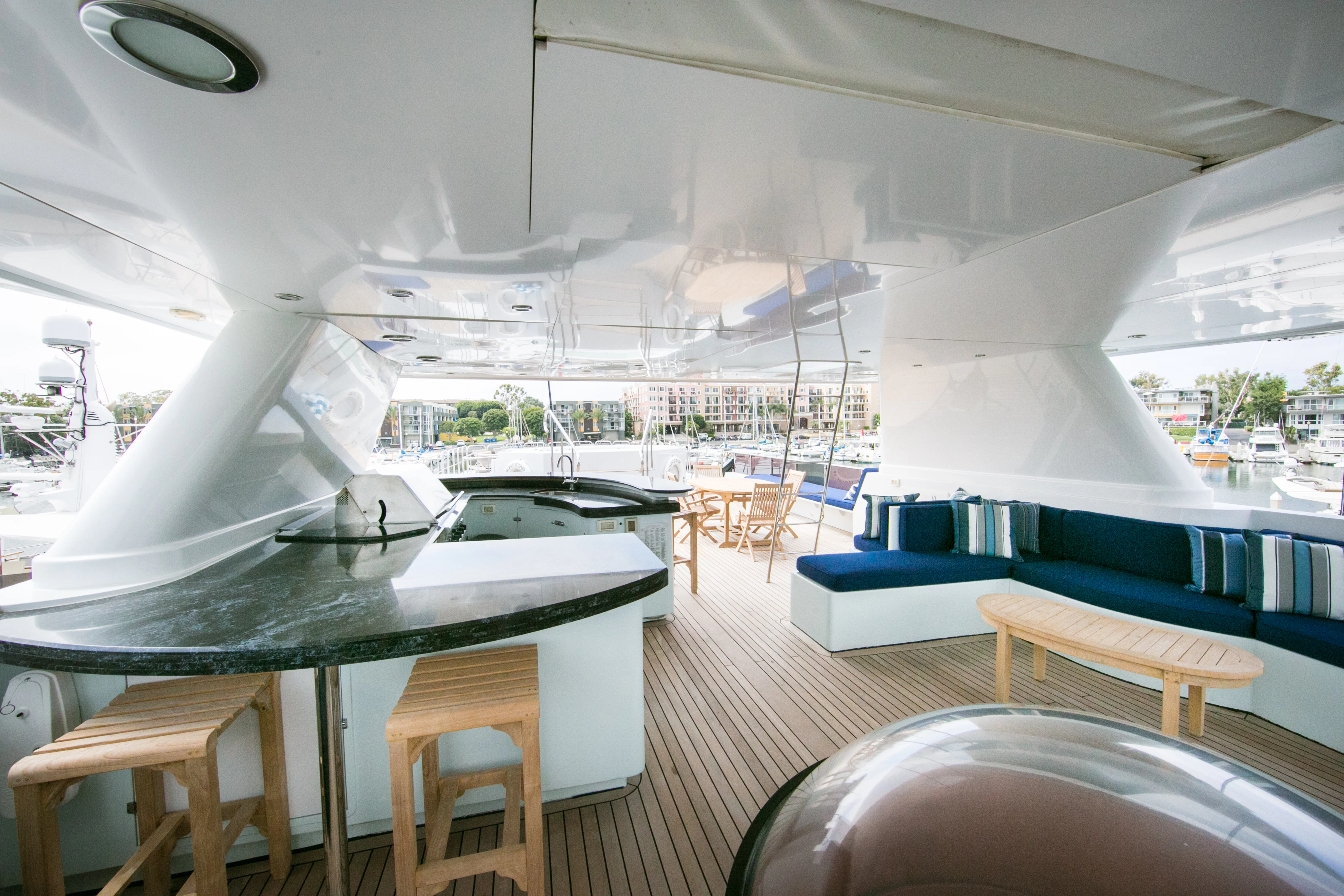 a room with a table and chairs aboard AURORA Yacht for Sale