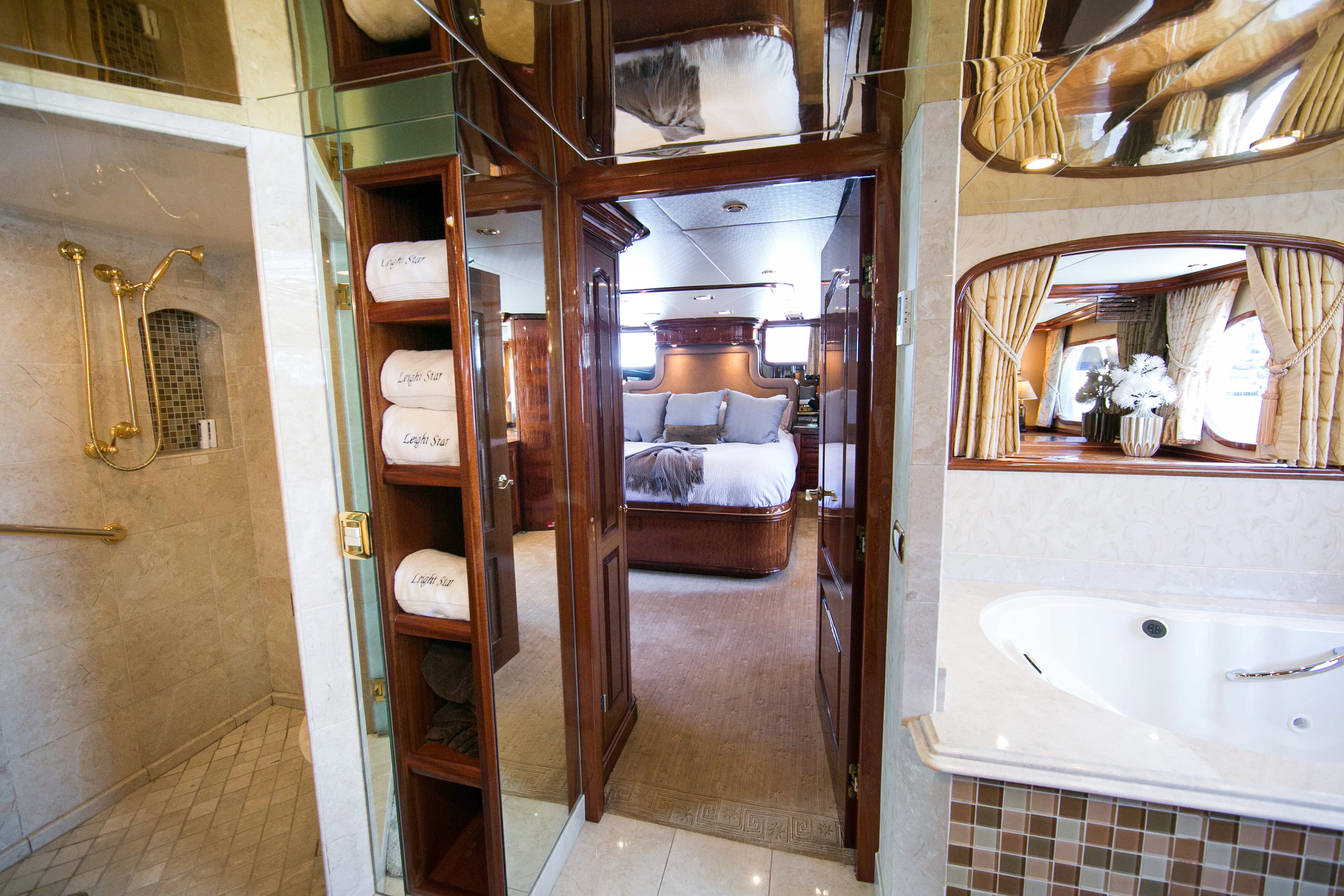 a bathroom with a shower and sink aboard AURORA Yacht for Sale