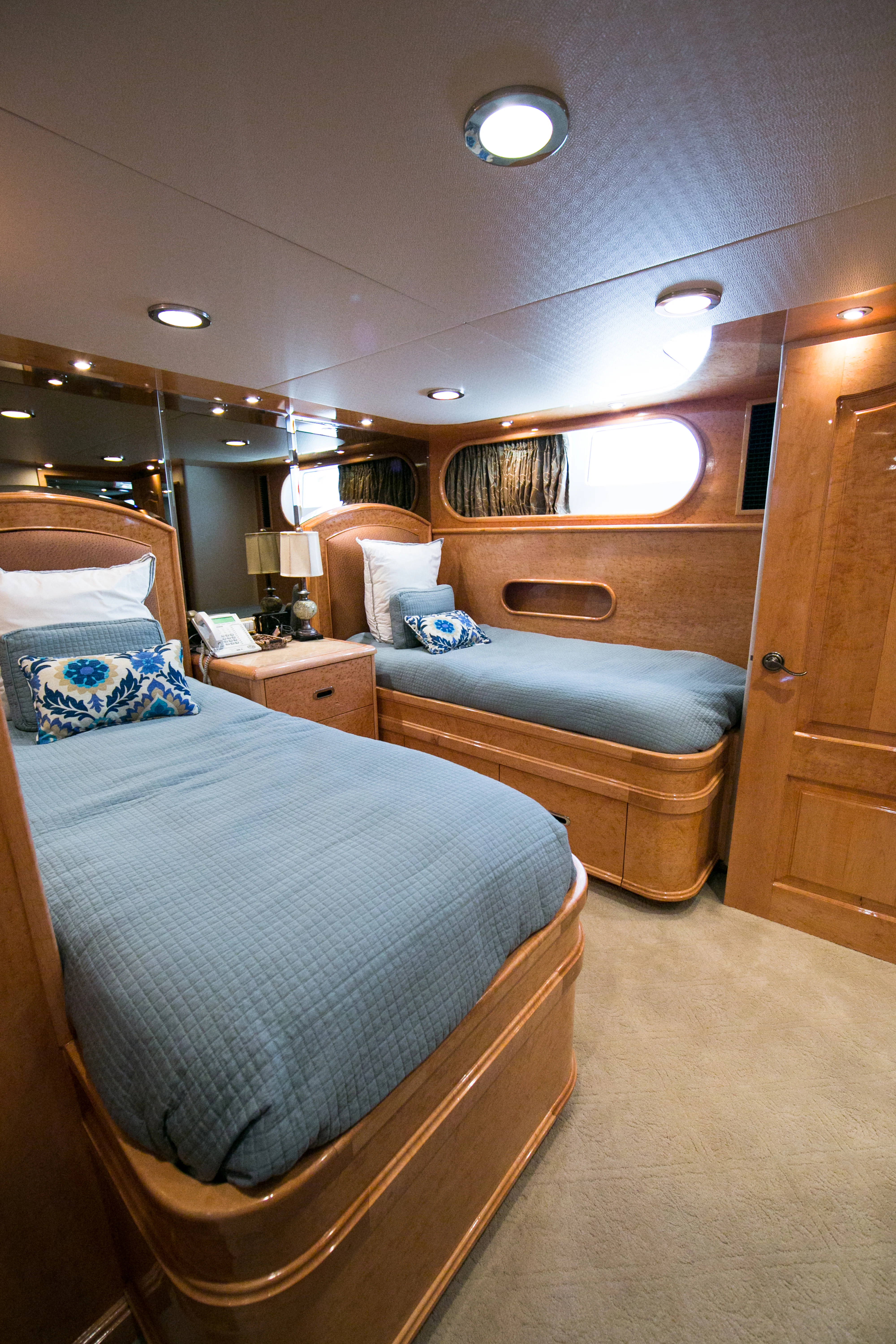 a room with two beds aboard AURORA Yacht for Sale