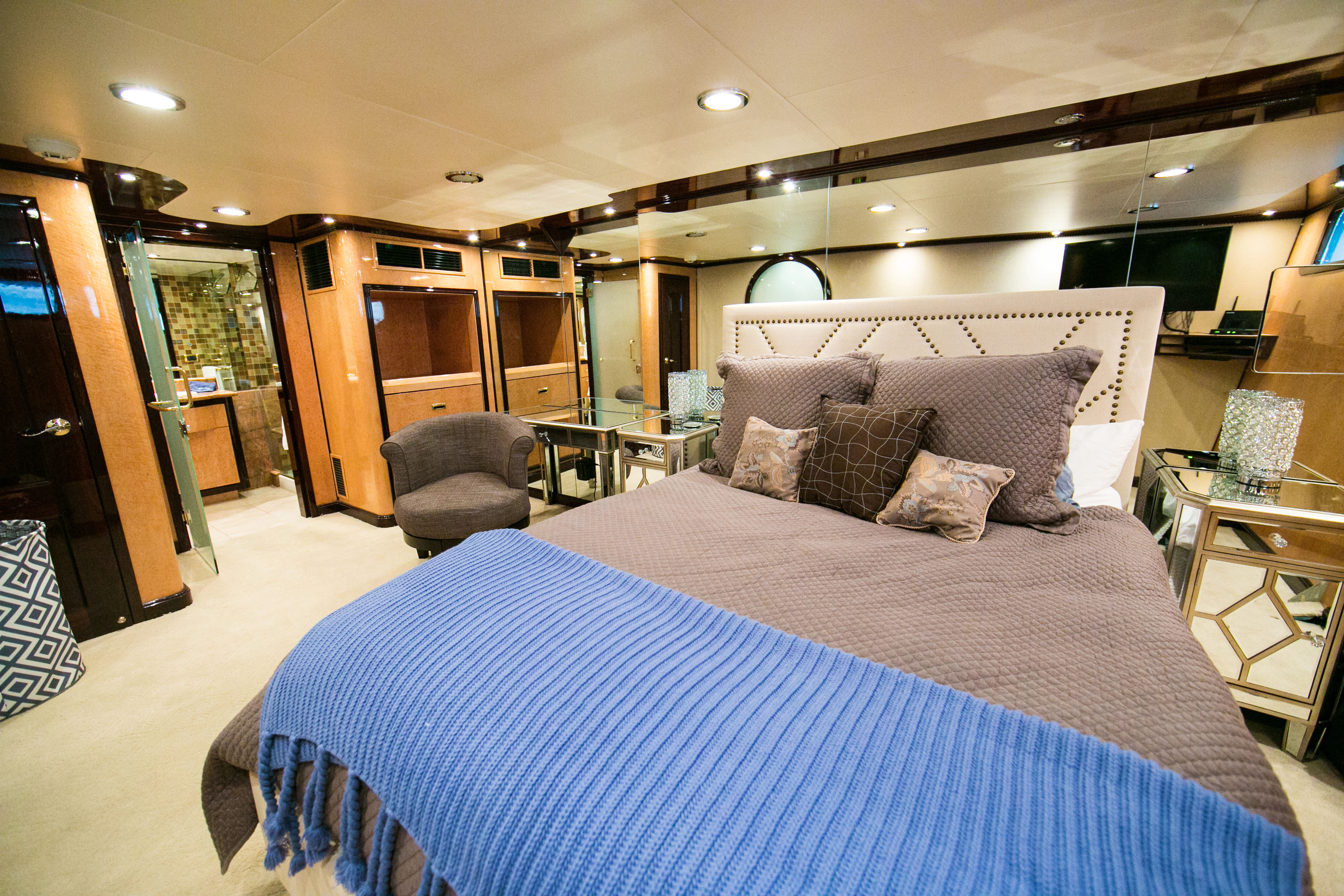 a bed in a room aboard AURORA Yacht for Sale