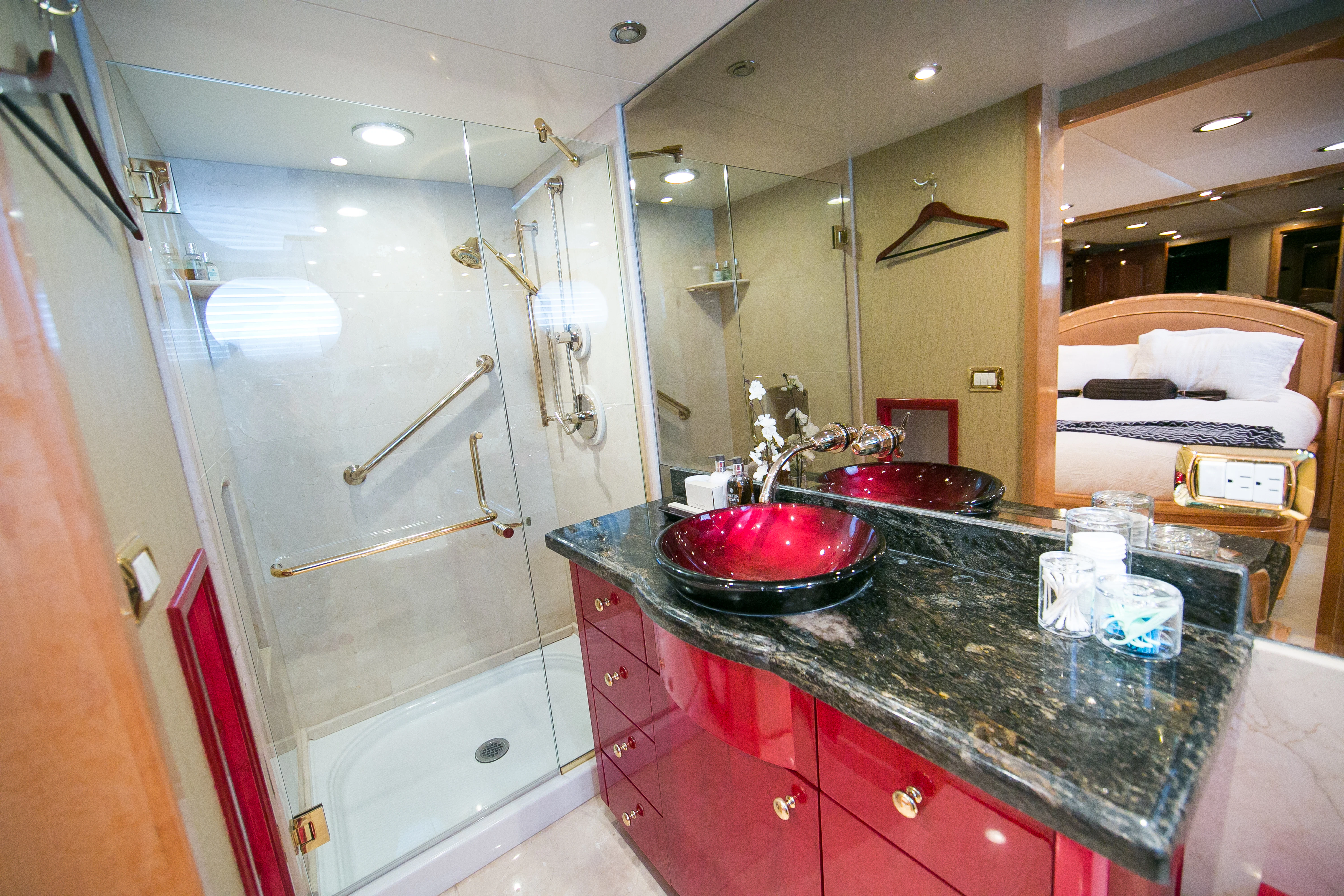 a bathroom with a sink and bathtub aboard AURORA Yacht for Sale