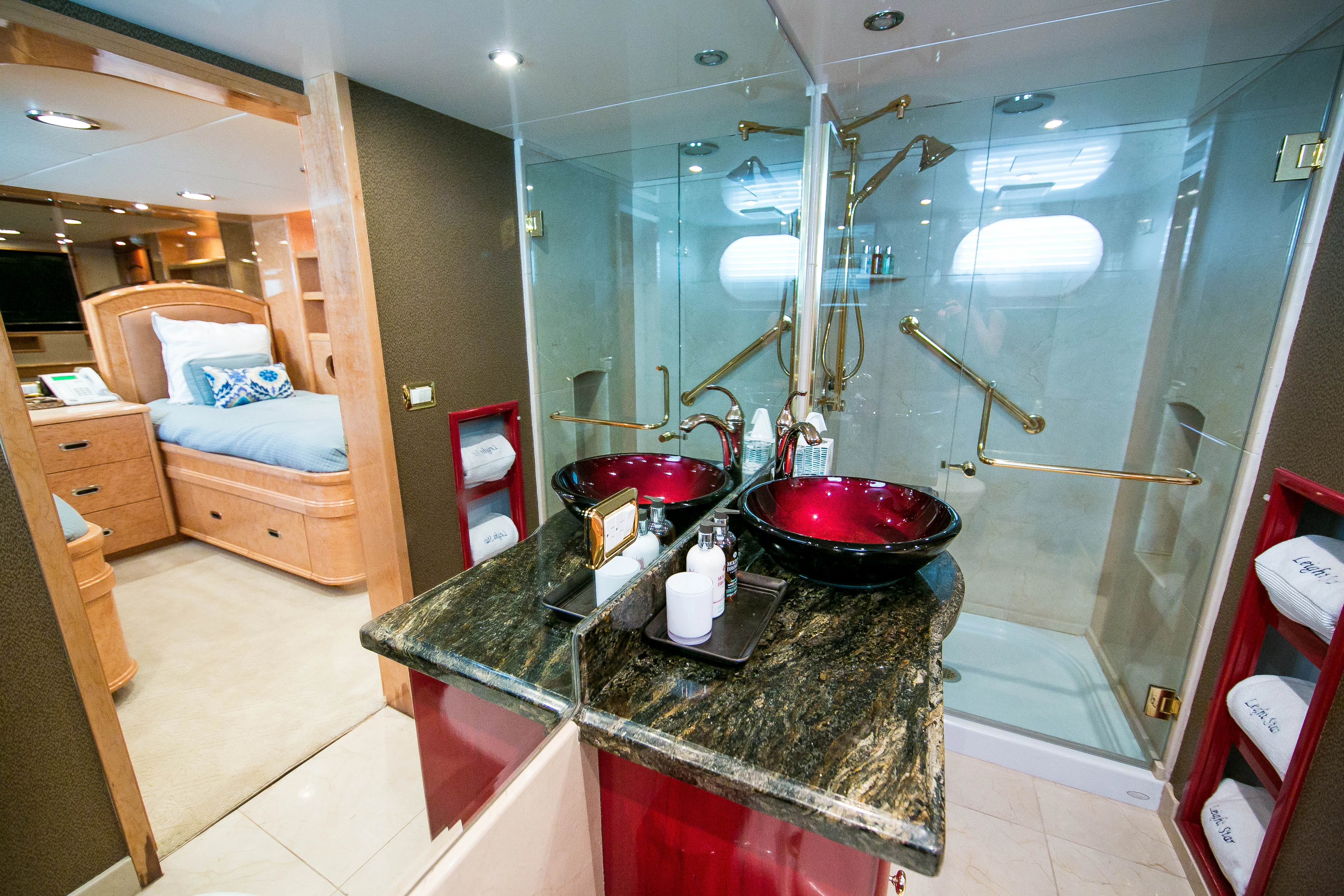 a bathroom with a sink and a bathtub aboard AURORA Yacht for Sale